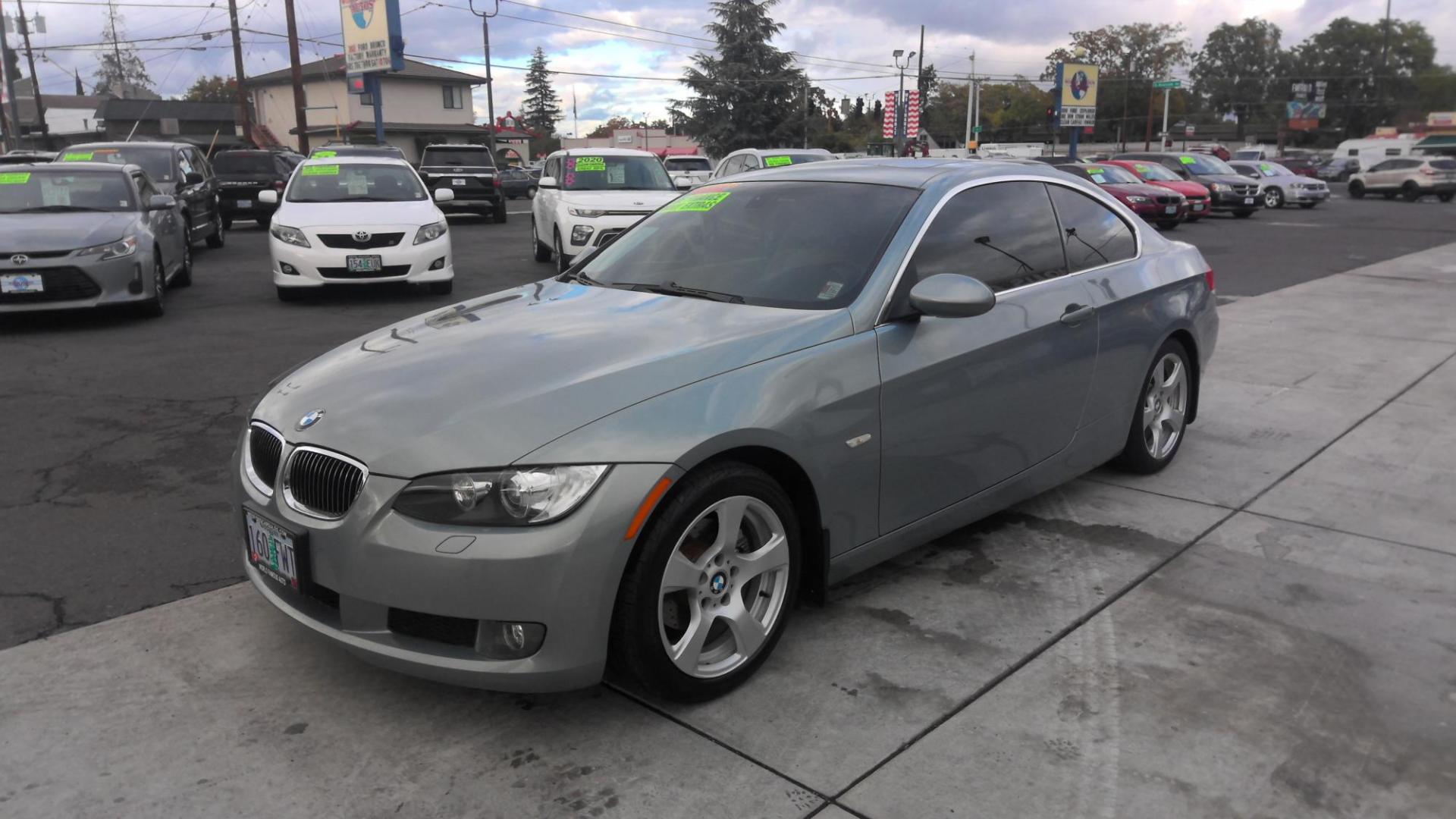 2007 GREEN BMW 3-Series 328xi Coupe (WBAWV535X7P) with an 3.0L L6 DOHC 24V engine, located at 502 S. Riverside Avenue, Medford, OR, 97501, (541) 773-3136, 42.322803, -122.867477 - Photo#0