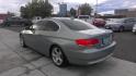 2007 GREEN BMW 3-Series 328xi Coupe (WBAWV535X7P) with an 3.0L L6 DOHC 24V engine, located at 502 S. Riverside Avenue, Medford, OR, 97501, (541) 773-3136, 42.322803, -122.867477 - Photo#3