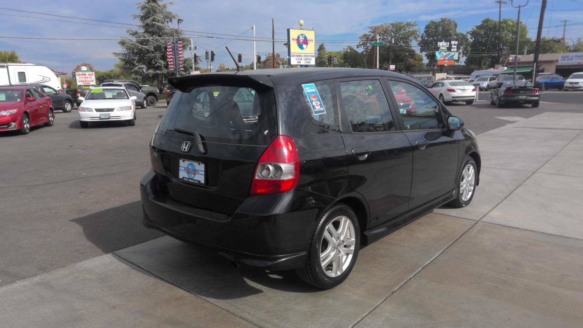 2007 BLACK Honda Fit Sport 5-Speed AT (JHMGD386X7S) with an 1.5L L4 SOHC 16V engine, 5-Speed Automatic Overdrive transmission, located at 502 S. Riverside Avenue, Medford, OR, 97501, (541) 773-3136, 42.322803, -122.867477 - Photo#3