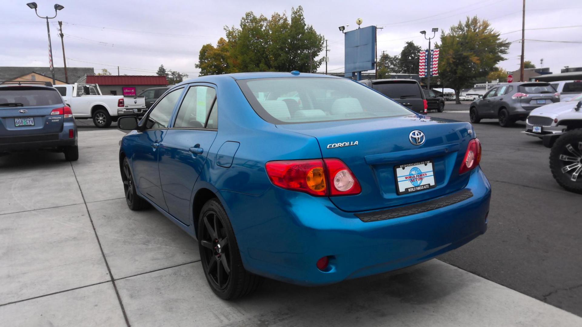 2009 BLUE Toyota Corolla Base 4-Speed AT (1NXBU40E29Z) with an 1.8L L4 DOHC 16V engine, 4-Speed Automatic Overdrive transmission, located at 502 S. Riverside Avenue, Medford, OR, 97501, (541) 773-3136, 42.322803, -122.867477 - Photo#2