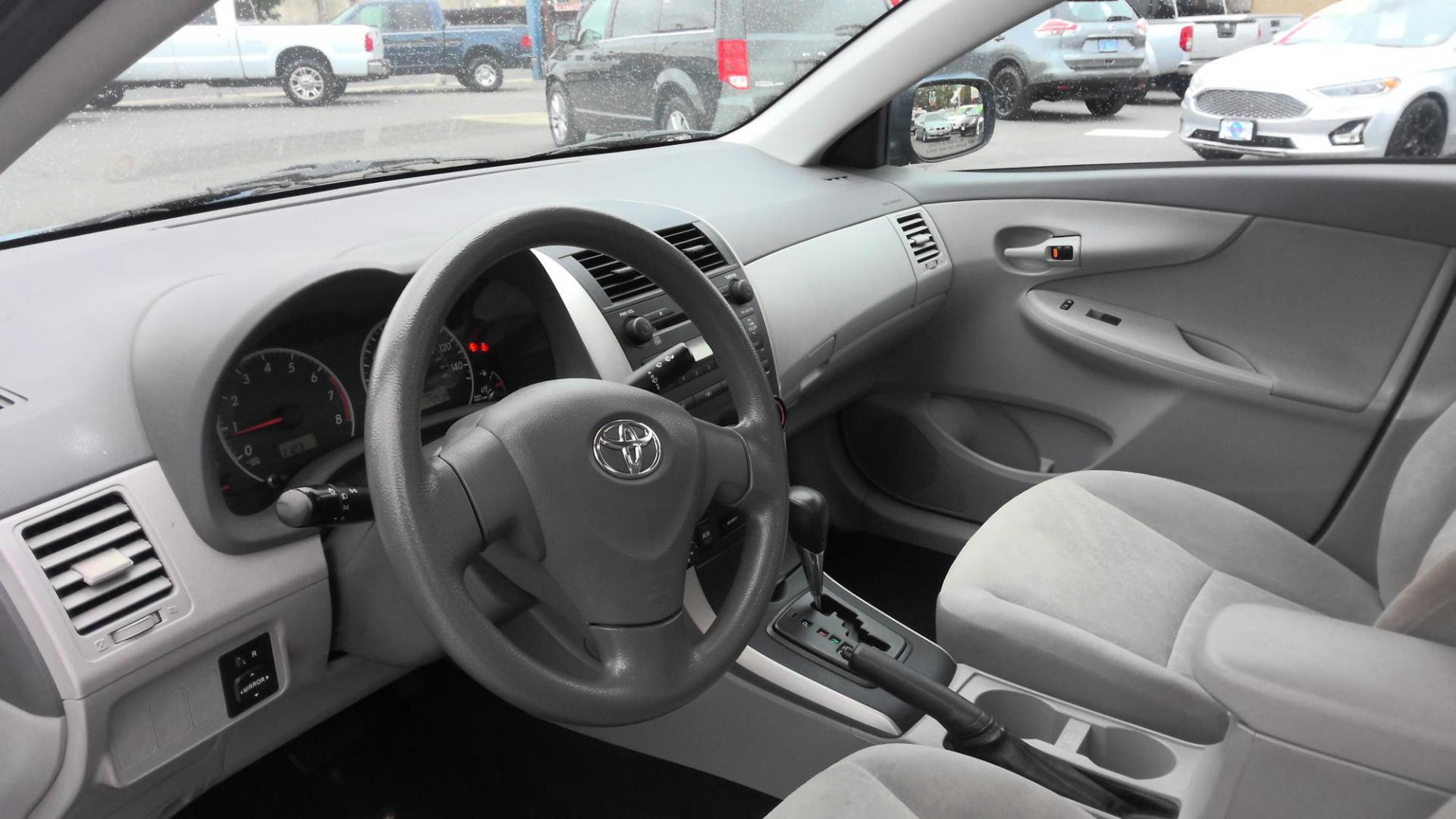 2009 BLUE Toyota Corolla Base 4-Speed AT (1NXBU40E29Z) with an 1.8L L4 DOHC 16V engine, 4-Speed Automatic Overdrive transmission, located at 502 S. Riverside Avenue, Medford, OR, 97501, (541) 773-3136, 42.322803, -122.867477 - Photo#4