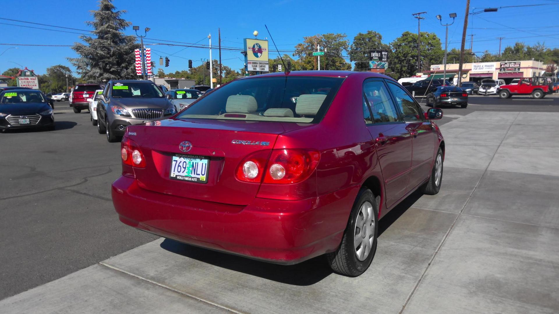 2005 RED TOYOTA COROLLA (1NXBR30E95Z) , located at 502 S. Riverside Avenue, Medford, OR, 97501, (541) 773-3136, 42.322803, -122.867477 - Photo#2