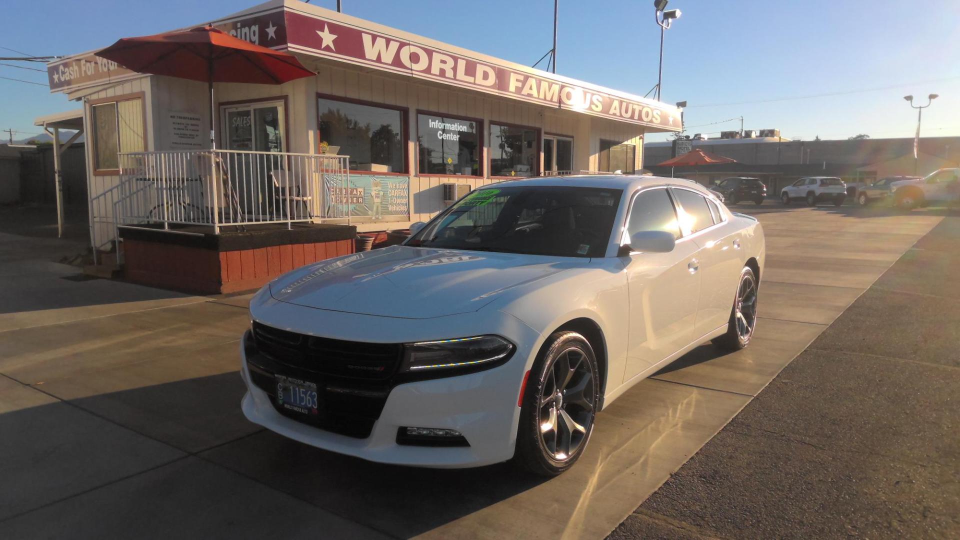 2016 WHITE Dodge Charger SXT (2C3CDXHG7GH) with an 3.6L V6 DOHC 24V engine, 8A transmission, located at 502 S. Riverside Avenue, Medford, OR, 97501, (541) 773-3136, 42.322803, -122.867477 - Photo#0