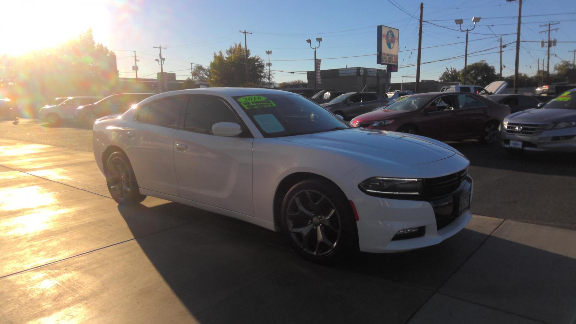 2016 WHITE Dodge Charger SXT (2C3CDXHG7GH) with an 3.6L V6 DOHC 24V engine, 8A transmission, located at 502 S. Riverside Avenue, Medford, OR, 97501, (541) 773-3136, 42.322803, -122.867477 - Photo#1