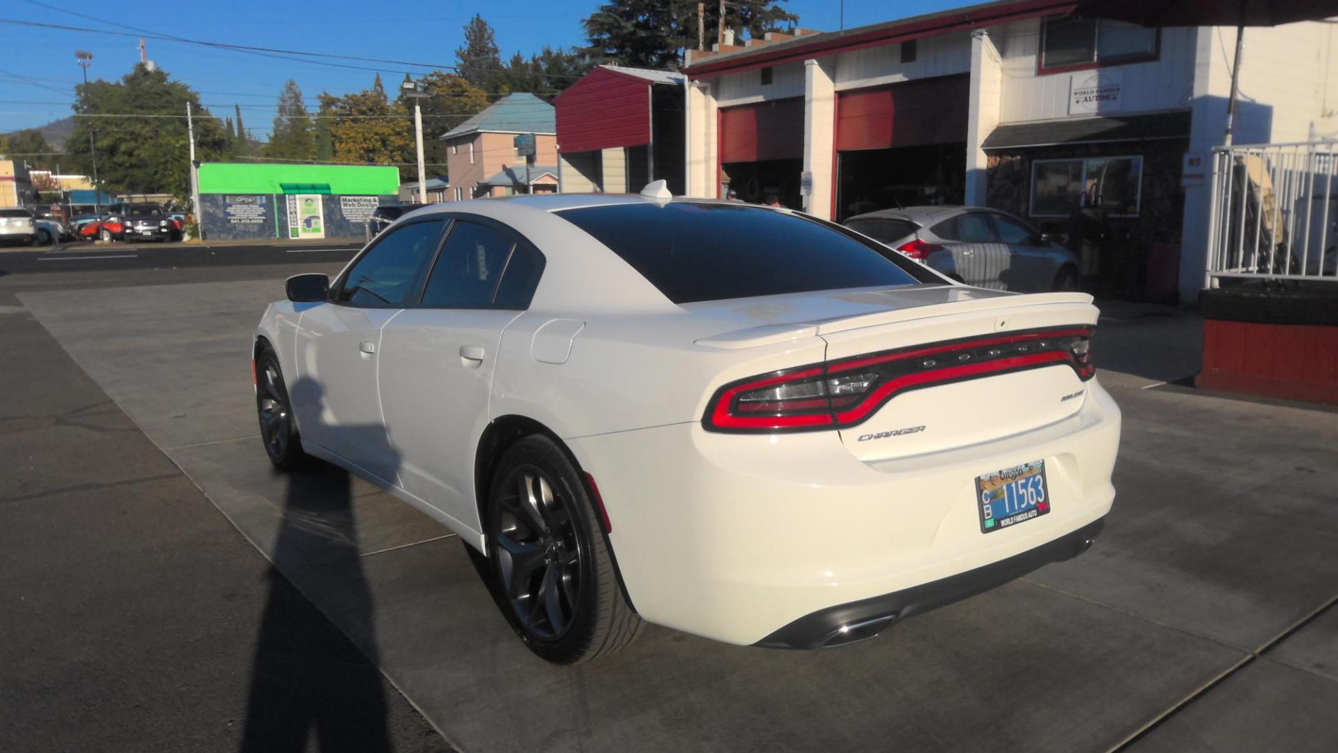 2016 WHITE Dodge Charger SXT (2C3CDXHG7GH) with an 3.6L V6 DOHC 24V engine, 8A transmission, located at 502 S. Riverside Avenue, Medford, OR, 97501, (541) 773-3136, 42.322803, -122.867477 - Photo#3