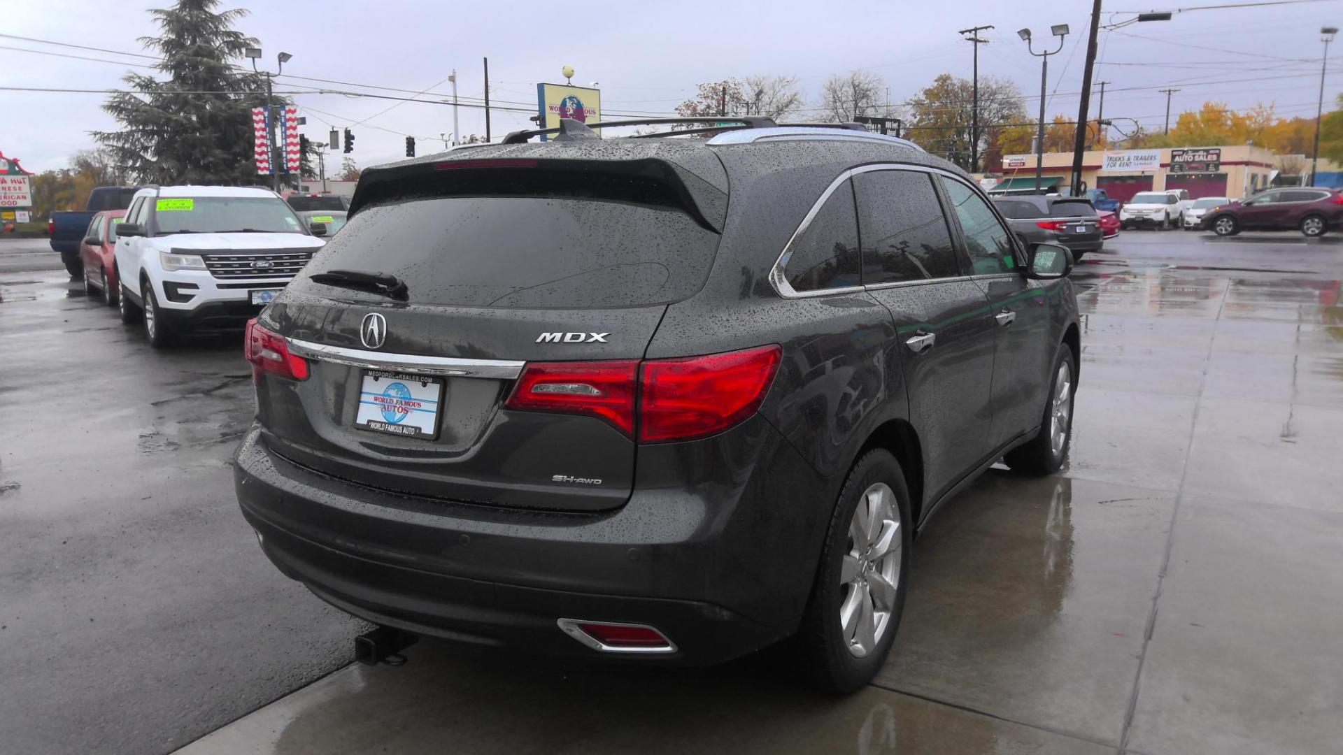 2016 GRAY Acura MDX 9-Spd AT SH-AWD w/Advance Package (5FRYD4H99GB) with an 3.5L V6 SOHC 24V engine, 9-Speed Automatic transmission, located at 502 S. Riverside Avenue, Medford, OR, 97501, (541) 773-3136, 42.322803, -122.867477 - Photo#3