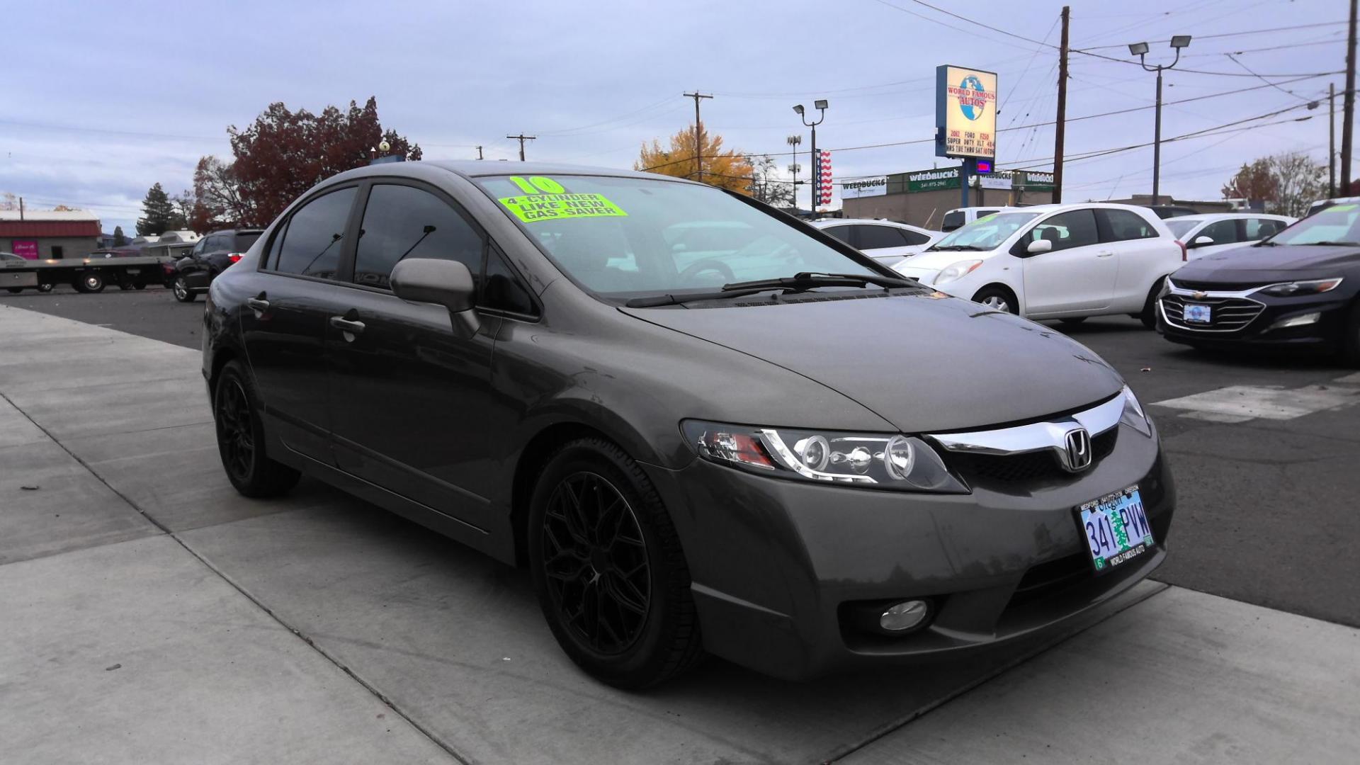 2010 GRAY Honda Civic LX Sedan 5-Speed AT (19XFA1F56AE) with an 1.8L L4 SOHC 16V engine, 5-Speed Automatic transmission, located at 502 S. Riverside Avenue, Medford, OR, 97501, (541) 773-3136, 42.322803, -122.867477 - Photo#1