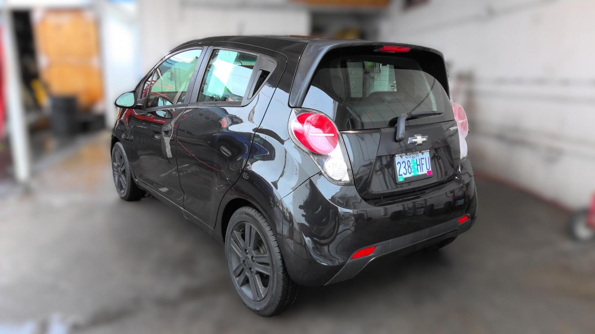 2014 BLACK Chevrolet Spark LS Auto (KL8CB6S99EC) with an 1.2L L4 16V DOHC engine, Continuously Variable Transmission transmission, located at 502 S. Riverside Avenue, Medford, OR, 97501, (541) 773-3136, 42.322803, -122.867477 - Photo#2