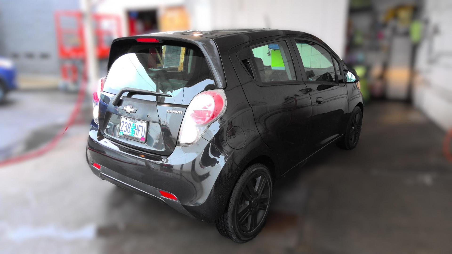 2014 BLACK Chevrolet Spark LS Auto (KL8CB6S99EC) with an 1.2L L4 16V DOHC engine, Continuously Variable Transmission transmission, located at 502 S. Riverside Avenue, Medford, OR, 97501, (541) 773-3136, 42.322803, -122.867477 - Photo#3