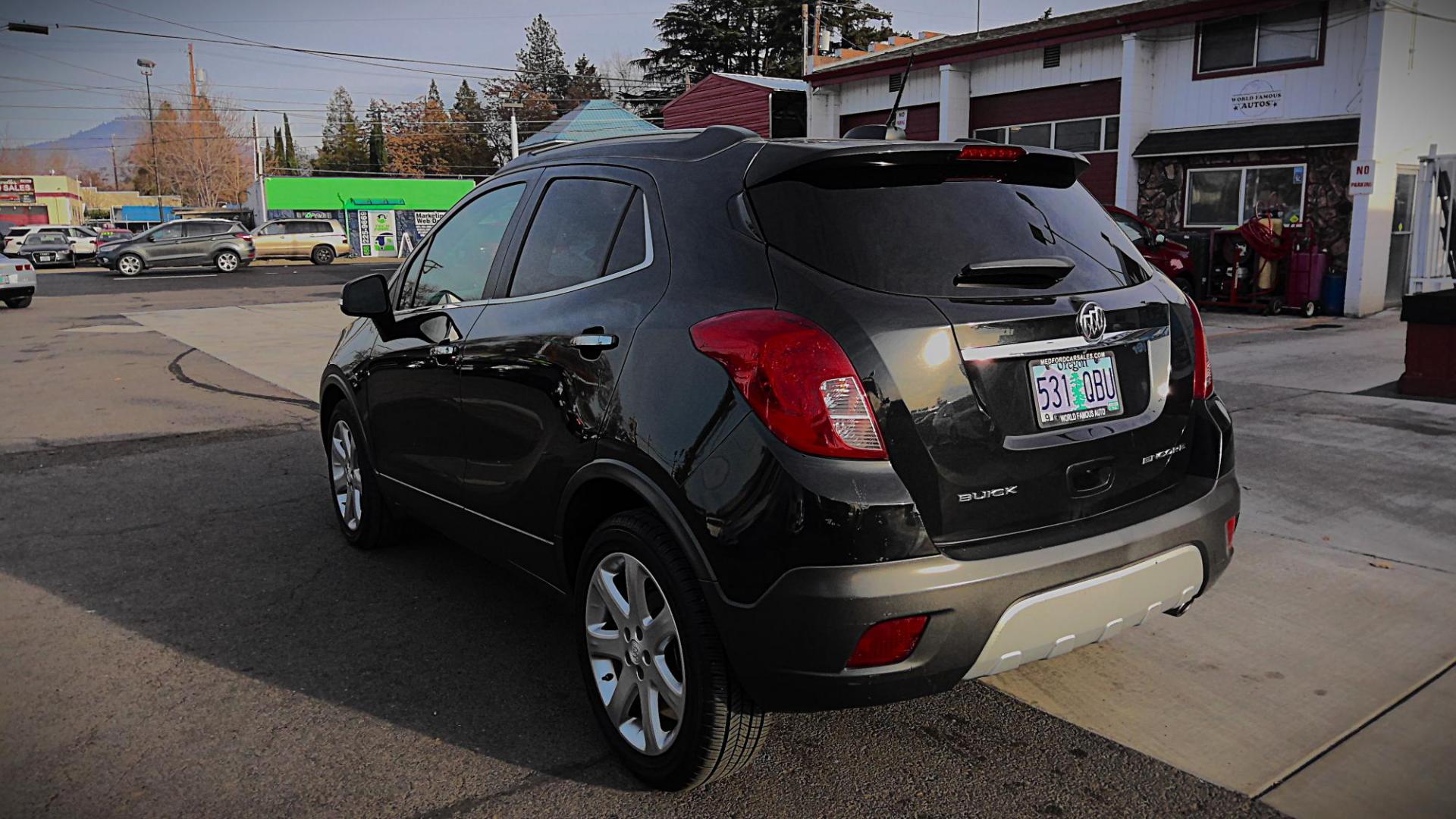 2015 BLACK Buick Encore Leather FWD (KL4CJCSB1FB) with an 1.4L L4 DOHC 16V TURBO engine, 6-Speed Automatic transmission, located at 502 S. Riverside Avenue, Medford, OR, 97501, (541) 773-3136, 42.322803, -122.867477 - Photo#3