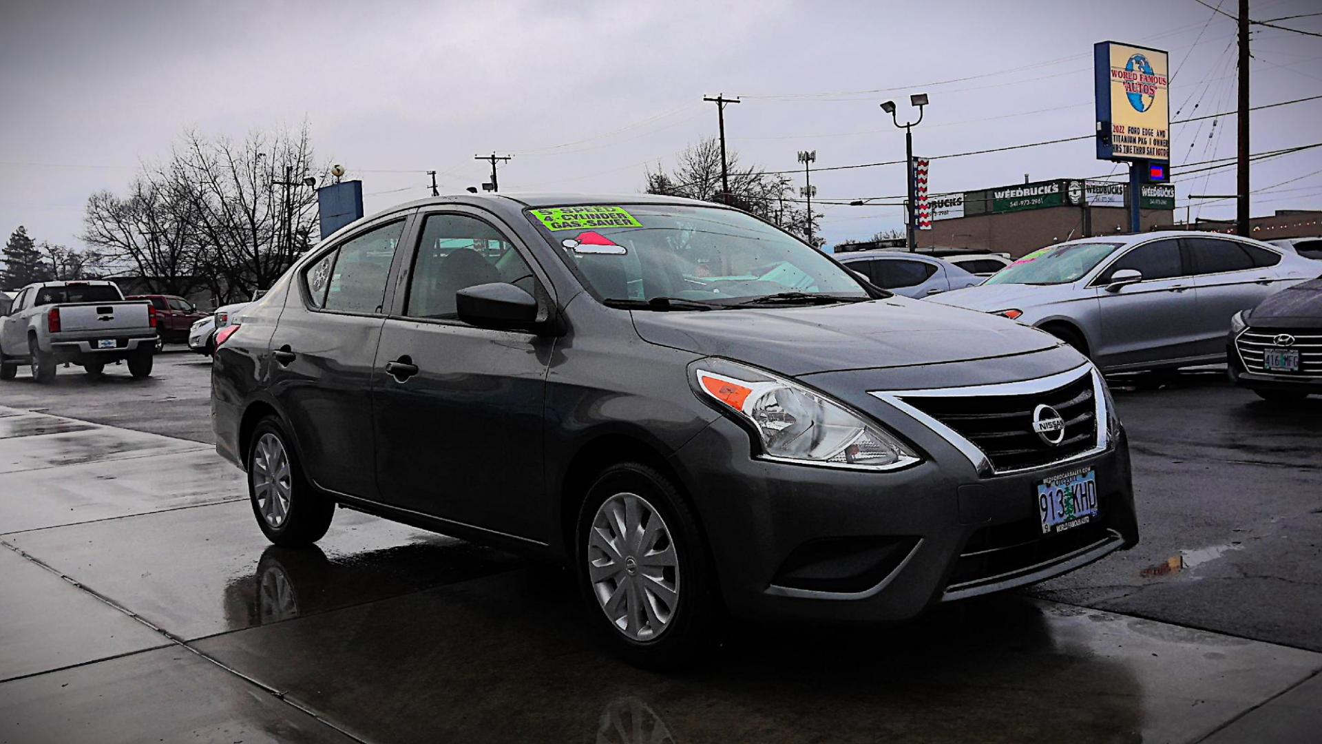 2016 GRAY Nissan Versa 1.6 S 5M (3N1CN7AP6GL) with an 1.6L L4 DOHC 16V engine, 5M transmission, located at 502 S. Riverside Avenue, Medford, OR, 97501, (541) 773-3136, 42.322803, -122.867477 - Photo#1