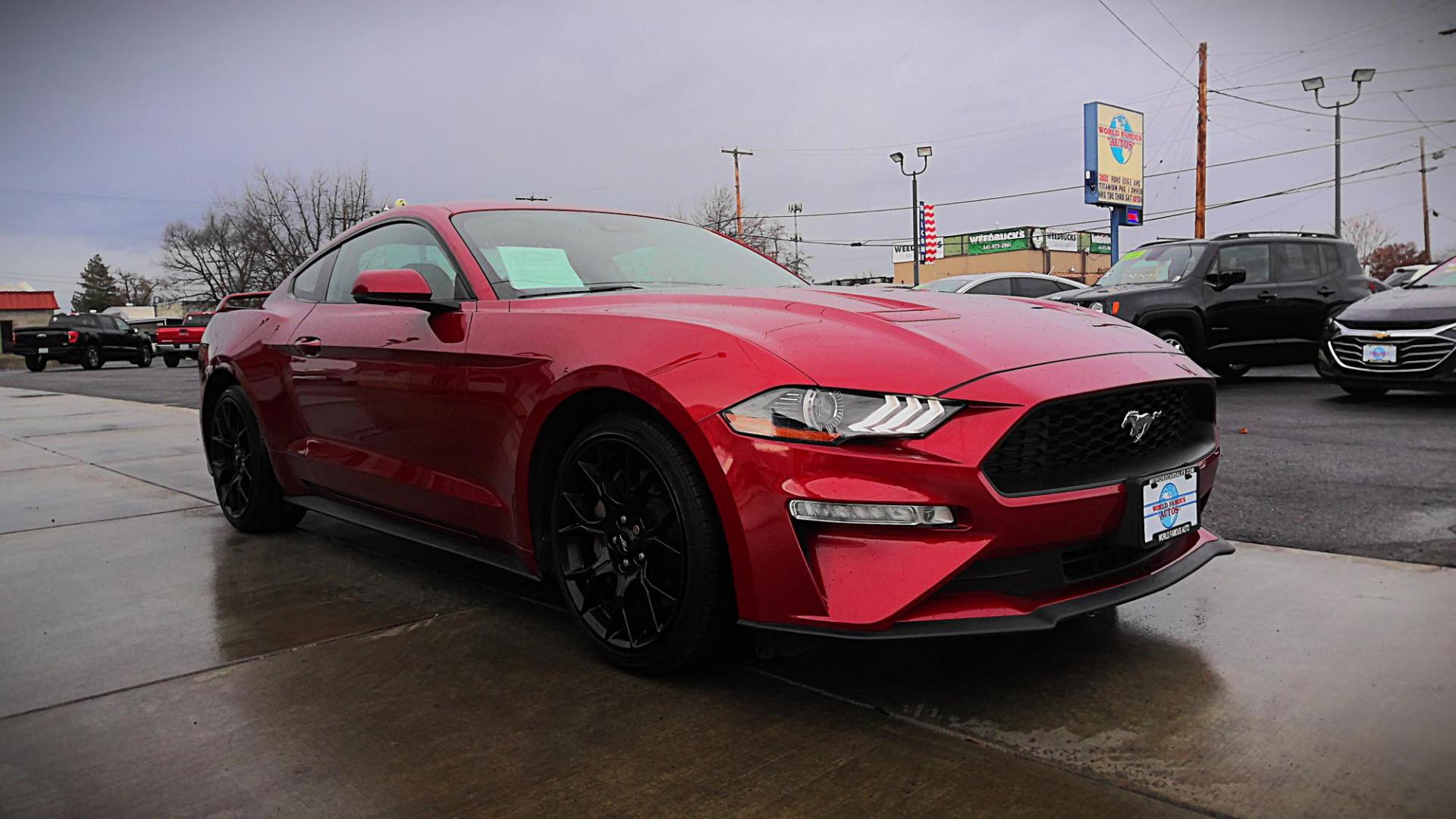 2019 RED Ford Mustang EcoBoost Coupe (1FA6P8TH5K5) with an 2.3L L4 DOHC 16V engine, located at 502 S. Riverside Avenue, Medford, OR, 97501, (541) 773-3136, 42.322803, -122.867477 - Photo#1