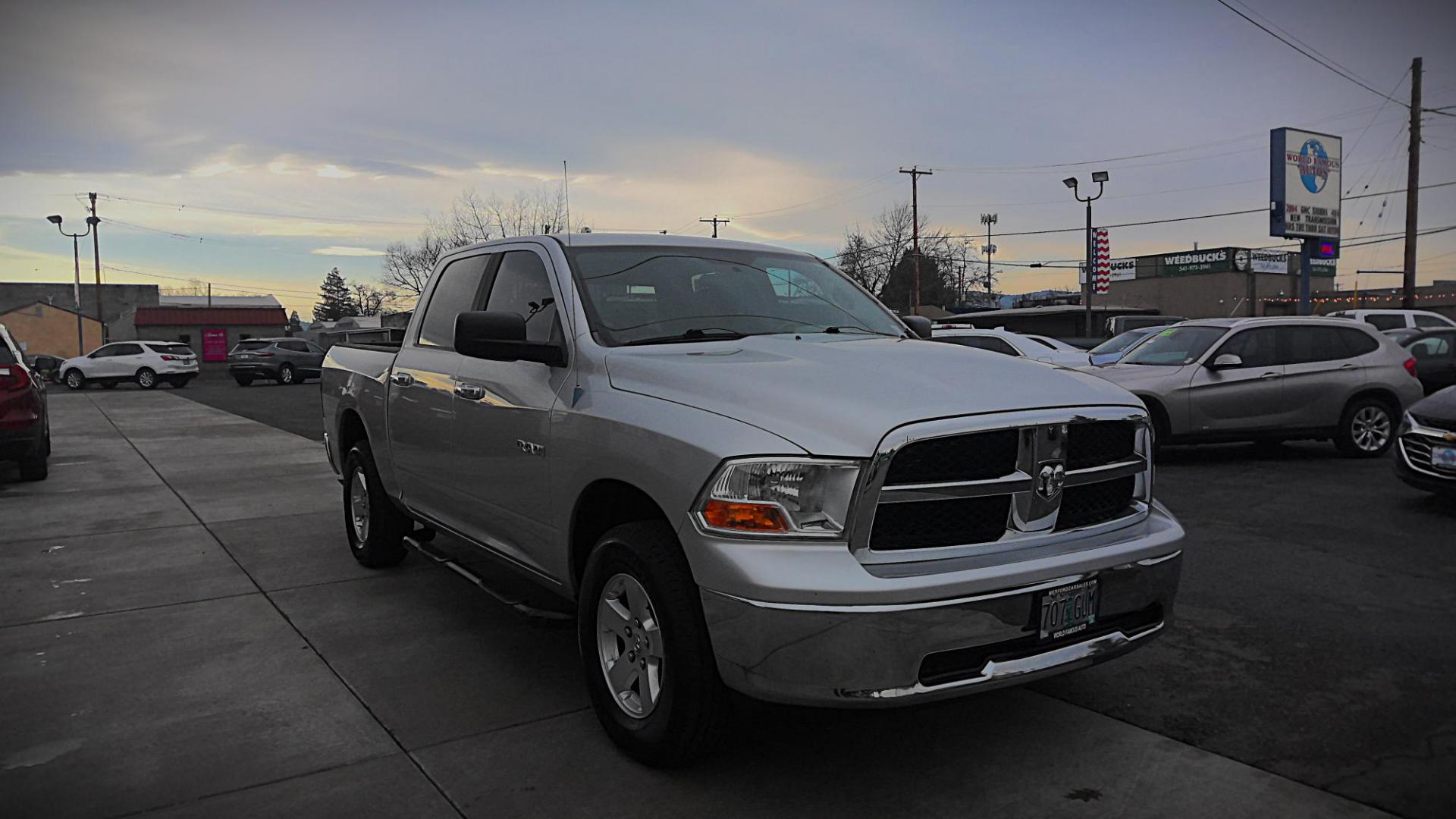 2010 SILVER Dodge Ram 1500 Laramie Crew Cab 4WD (1D7RV1CP5AS) with an 4.7L V8 SOHC 16V FFV engine, 5-Speed Automatic transmission, located at 502 S. Riverside Avenue, Medford, OR, 97501, (541) 773-3136, 42.322803, -122.867477 - Photo#1