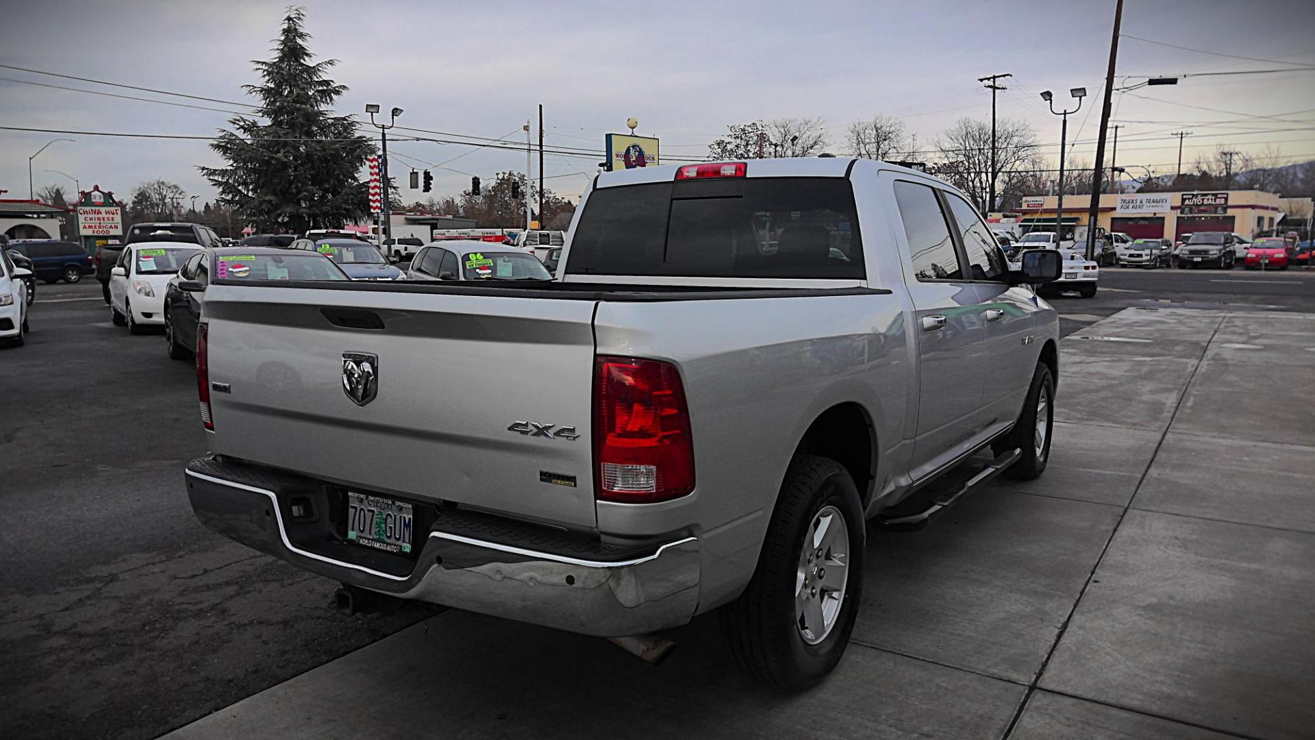 2010 SILVER Dodge Ram 1500 Laramie Crew Cab 4WD (1D7RV1CP5AS) with an 4.7L V8 SOHC 16V FFV engine, 5-Speed Automatic transmission, located at 502 S. Riverside Avenue, Medford, OR, 97501, (541) 773-3136, 42.322803, -122.867477 - Photo#2