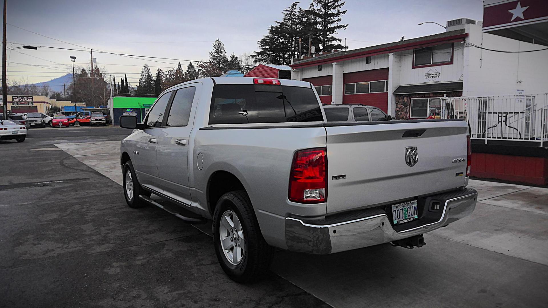 2010 SILVER Dodge Ram 1500 Laramie Crew Cab 4WD (1D7RV1CP5AS) with an 4.7L V8 SOHC 16V FFV engine, 5-Speed Automatic transmission, located at 502 S. Riverside Avenue, Medford, OR, 97501, (541) 773-3136, 42.322803, -122.867477 - Photo#3