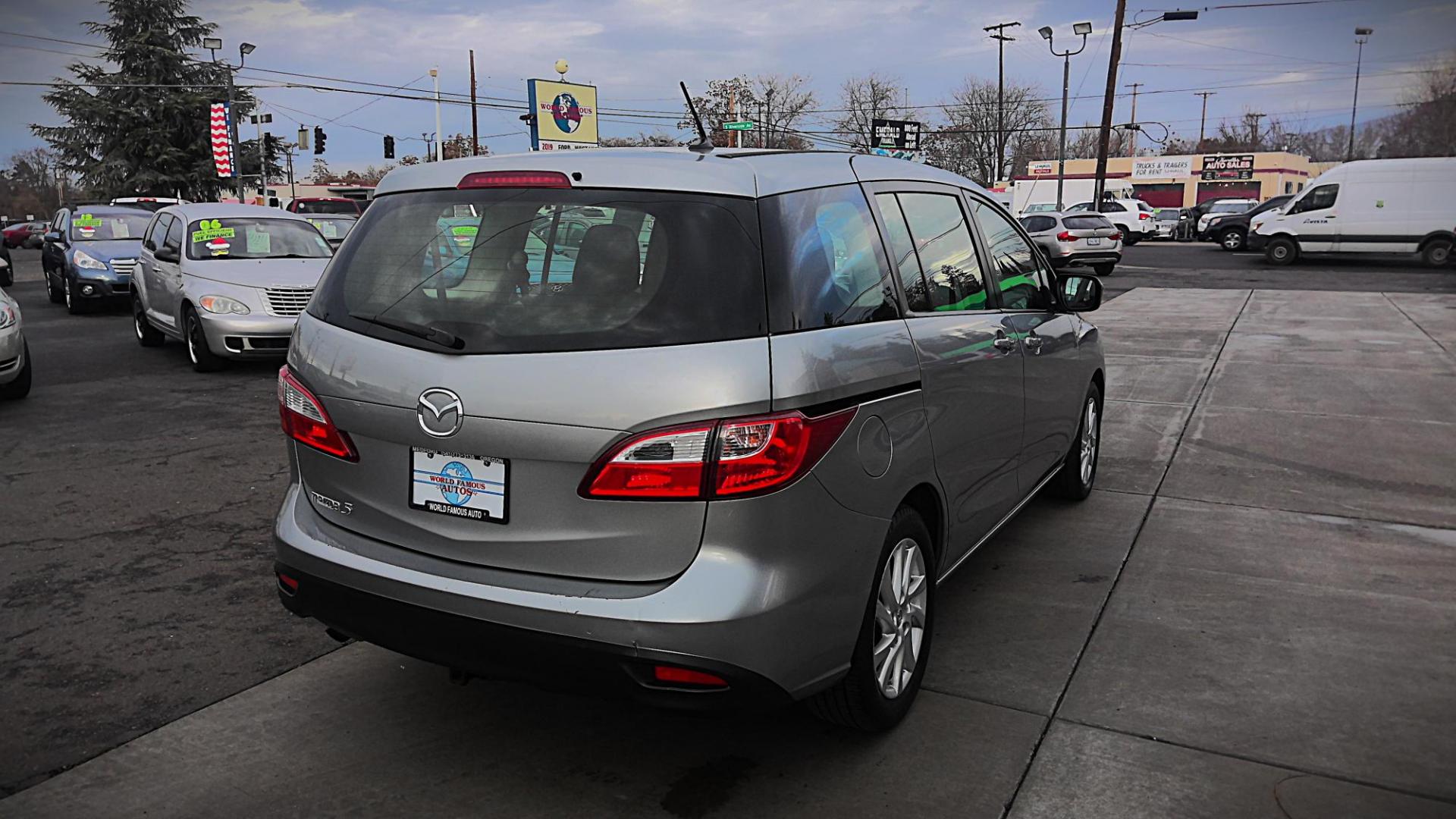 2011 SILVER Mazda MAZDA5 Sport (JM1CW2BL2C0) with an 2.5L L4 DOHC 16V engine, located at 502 S. Riverside Avenue, Medford, OR, 97501, (541) 773-3136, 42.322803, -122.867477 - Photo#2