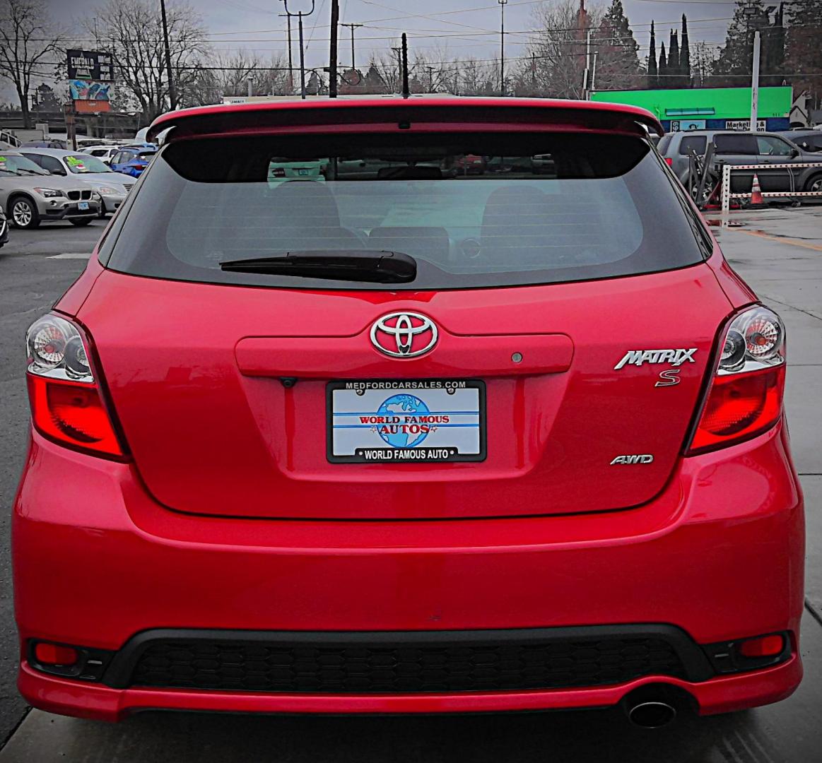 2013 RED Toyota Matrix S AWD 4-Speed AT (2T1LE4EE1DC) with an 1.8L L4 DOHC 16V engine, 4-Speed Automatic transmission, located at 502 S. Riverside Avenue, Medford, OR, 97501, (541) 773-3136, 42.322803, -122.867477 - Photo#2