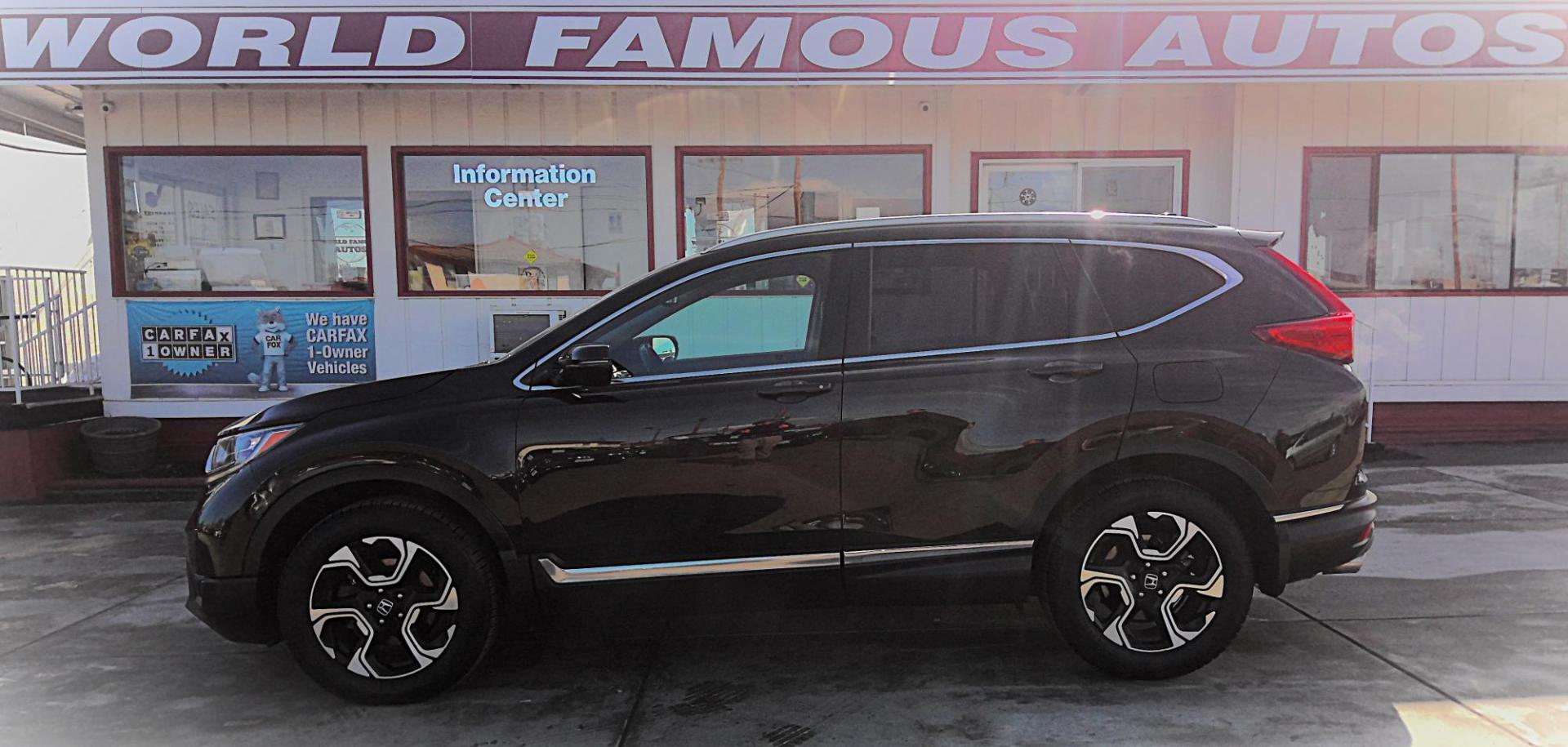 2017 BLACK Honda CR-V Touring AWD (5J6RW2H92HL) with an 2.4L L4 DOHC 16V engine, CVT transmission, located at 502 S. Riverside Avenue, Medford, OR, 97501, (541) 773-3136, 42.322803, -122.867477 - Photo#0