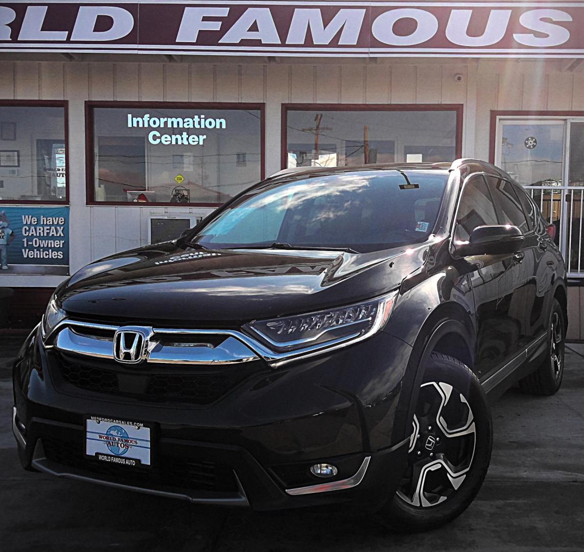 2017 BLACK Honda CR-V Touring AWD (5J6RW2H92HL) with an 2.4L L4 DOHC 16V engine, CVT transmission, located at 502 S. Riverside Avenue, Medford, OR, 97501, (541) 773-3136, 42.322803, -122.867477 - Photo#1