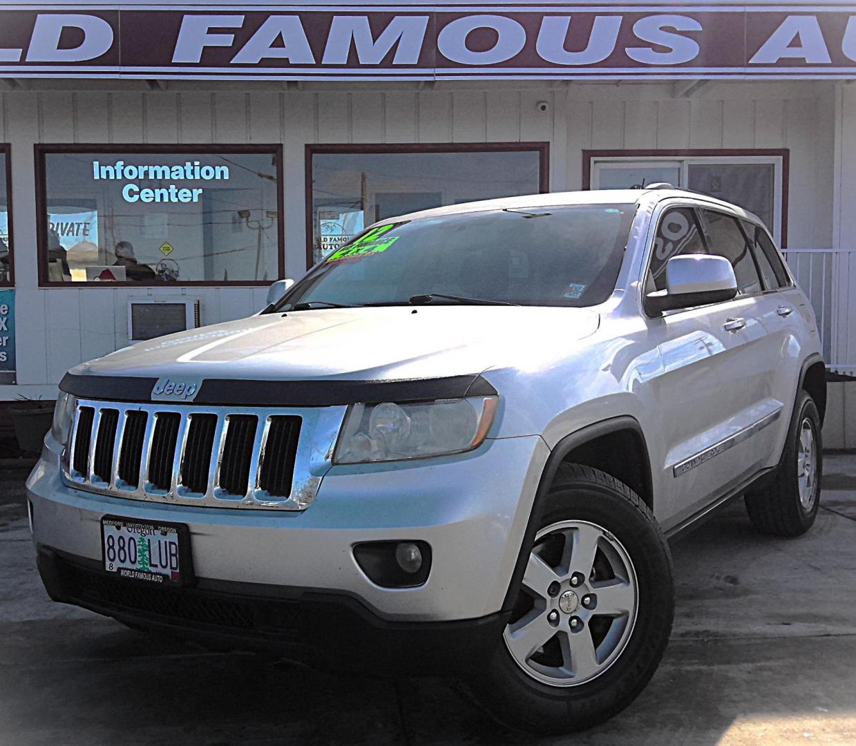 2012 SILVER Jeep Grand Cherokee Laredo 4WD (1C4RJFAGXCC) with an 3.6L V6 DOHC 24V engine, 5-Speed Automatic transmission, located at 502 S. Riverside Avenue, Medford, OR, 97501, (541) 773-3136, 42.322803, -122.867477 - Photo#1