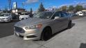 2015 GOLD Ford Fusion SE (3FA6P0H74FR) with an 2.5L L4 DOHC 16V engine, located at 502 S. Riverside Avenue, Medford, OR, 97501, (541) 773-3136, 42.322803, -122.867477 - Photo#0