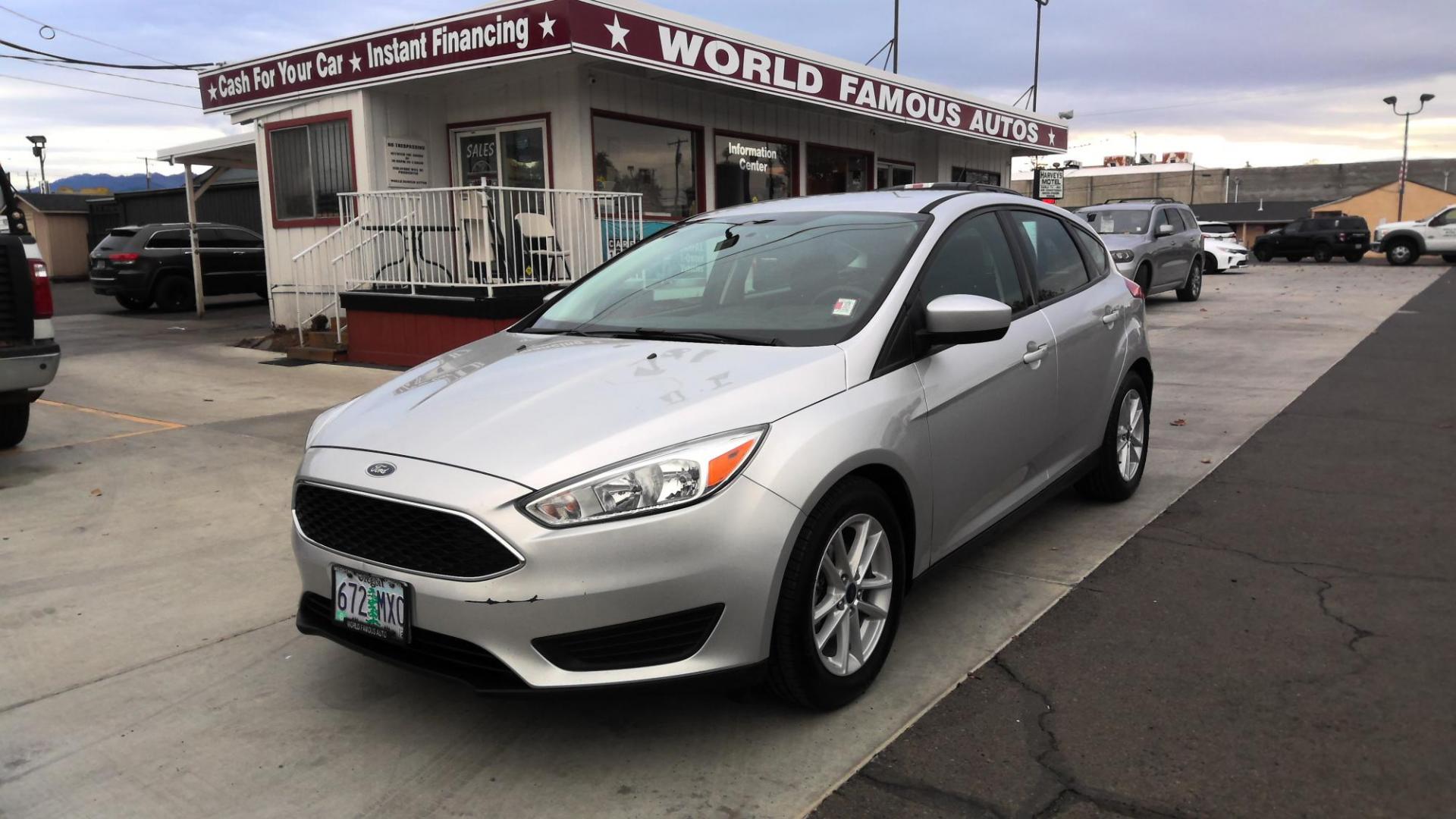 2018 SILVER Ford Focus SE Hatch (1FADP3K20JL) with an 2.0L L4 DOHC 16V engine, located at 502 S. Riverside Avenue, Medford, OR, 97501, (541) 773-3136, 42.322803, -122.867477 - Photo#0