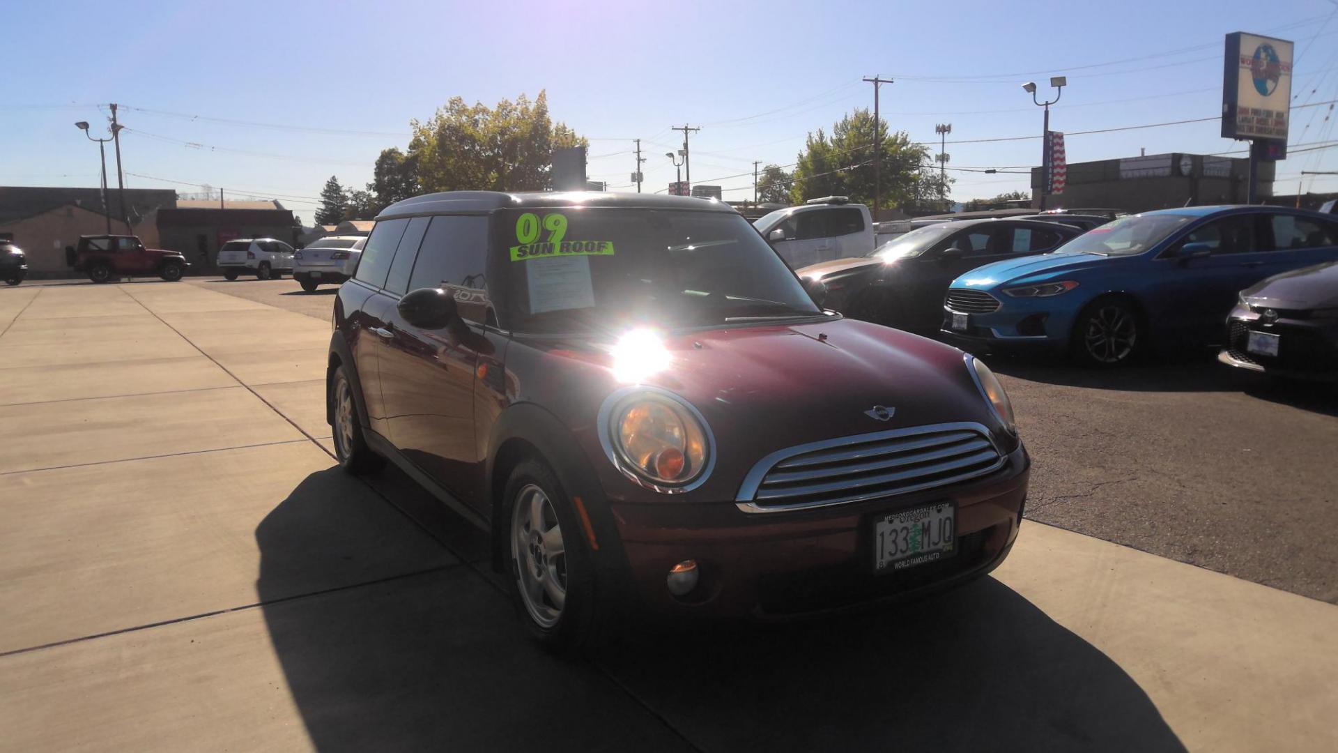 2009 RED /Gray Mini Clubman Base (WMWML33569T) with an 1.6L L4 DOHC 16V engine, Manual transmission, located at 502 S. Riverside Avenue, Medford, OR, 97501, (541) 773-3136, 42.322803, -122.867477 - Picture yourself on the streets of Venice in this 2009 Mini Cooper Clubman is a super fun little manual-transmission hatchback. - Photo#1