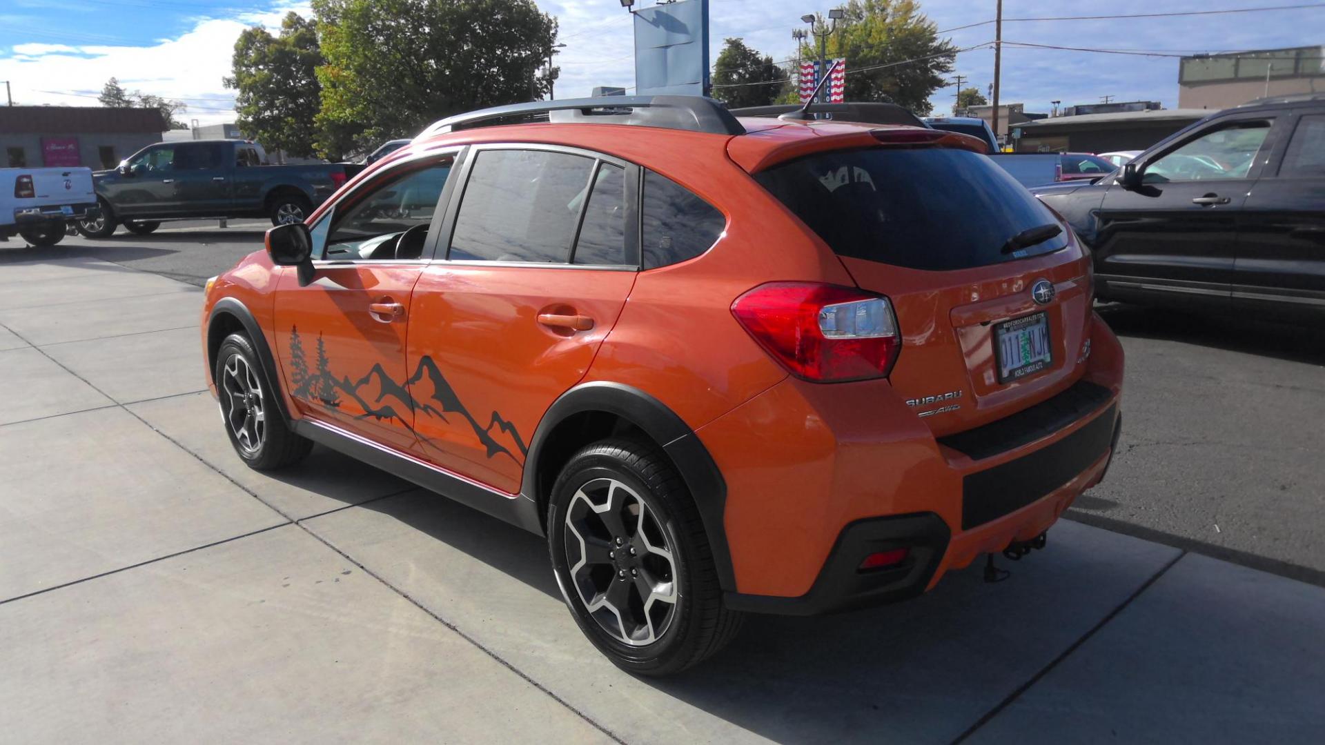 2014 ORANGE Subaru XV Crosstrek 2.0 Limited (JF2GPAKC3E8) with an 2.0L L4 DOHC 16V engine, Continuously Variable Transmission transmission, located at 502 S. Riverside Avenue, Medford, OR, 97501, (541) 773-3136, 42.322803, -122.867477 - Photo#2