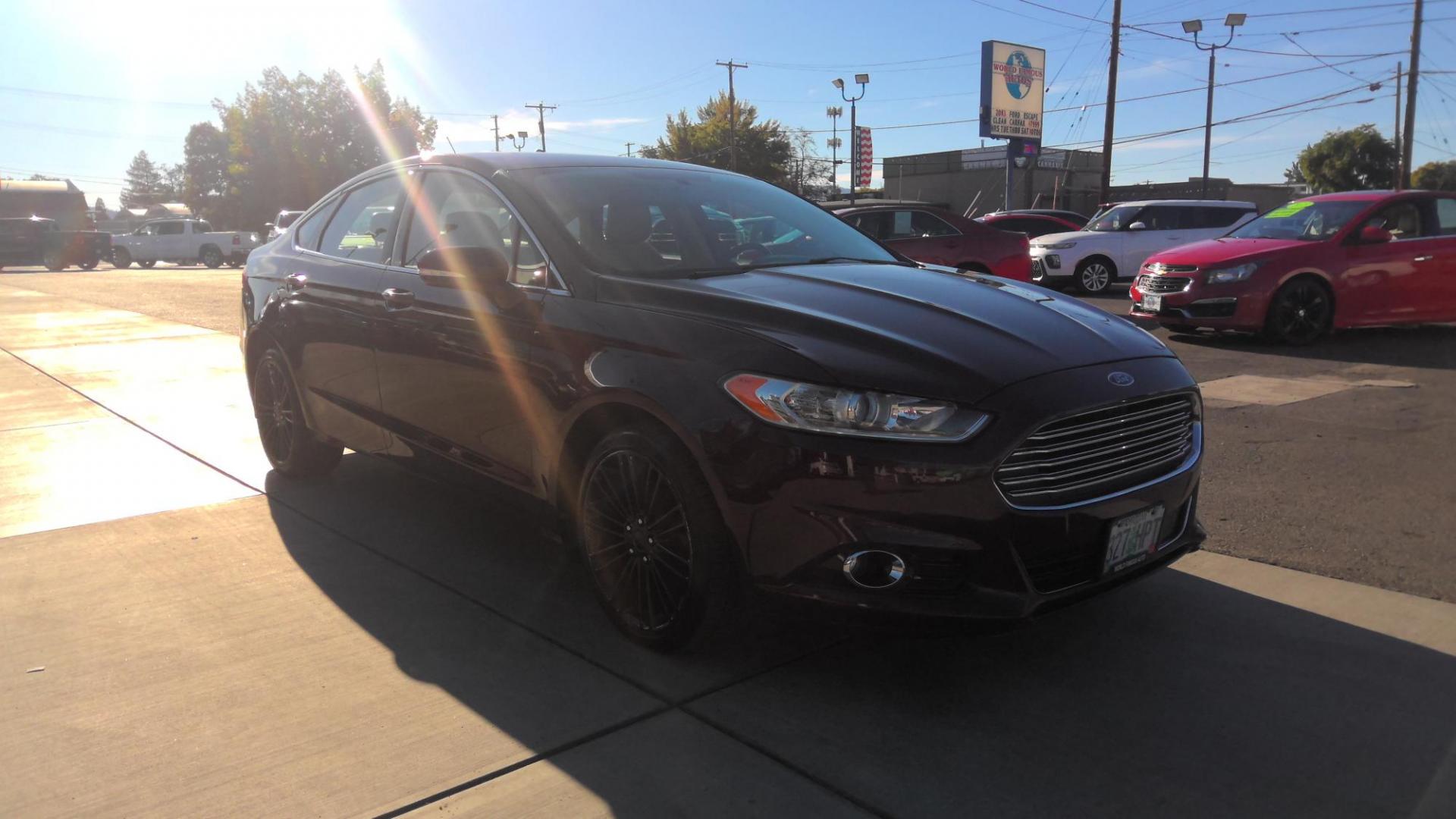 2013 MAROON Ford Fusion SE (3FA6P0H93DR) with an 2.0L L4 DOHC 16V engine, located at 502 S. Riverside Avenue, Medford, OR, 97501, (541) 773-3136, 42.322803, -122.867477 - Photo#1