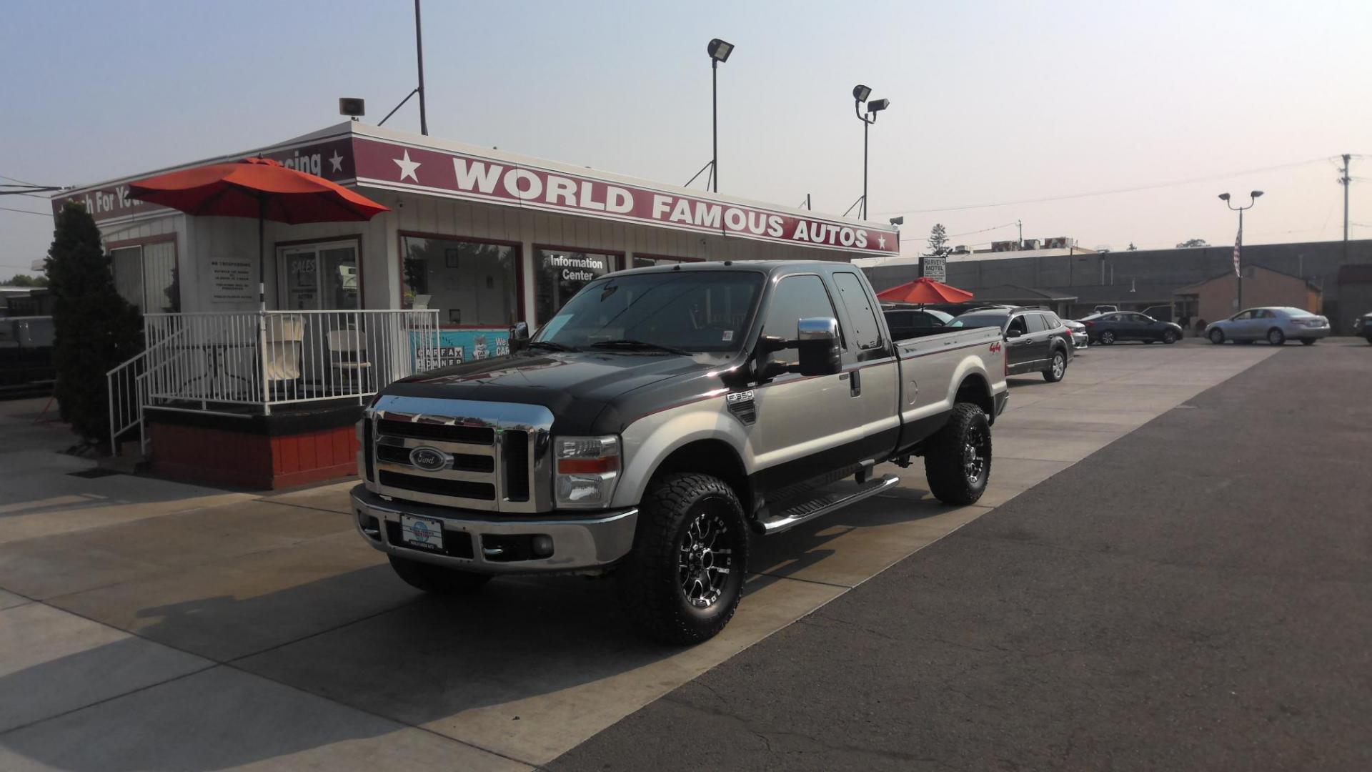 2008 BLACK Ford F-350 SD FX4 SuperCab (1FTWX31RX8E) with an 6.4L V8 OHV 32V TURBO DIESEL engine, located at 502 S. Riverside Avenue, Medford, OR, 97501, (541) 773-3136, 42.322803, -122.867477 - Check out this sweet beauty of a truck! A 2008 F-350 FX4 Lariat with 6.4L V8 Turbo Diesel PowerStroke and full 8-ft bed! Brand new tires and wheels on this two-tone paint package really pop. Leather seats, power seats, double batteries, tow package, made for work, made for play, come check it out - Photo#0