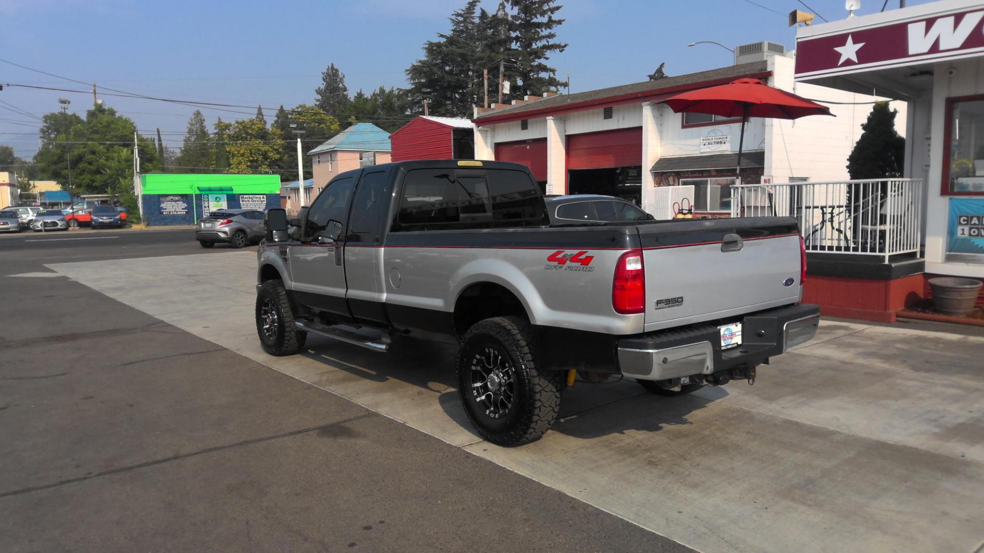 2008 BLACK Ford F-350 SD FX4 SuperCab (1FTWX31RX8E) with an 6.4L V8 OHV 32V TURBO DIESEL engine, located at 502 S. Riverside Avenue, Medford, OR, 97501, (541) 773-3136, 42.322803, -122.867477 - Check out this sweet beauty of a truck! A 2008 F-350 FX4 Lariat with 6.4L V8 Turbo Diesel PowerStroke and full 8-ft bed! Brand new tires and wheels on this two-tone paint package really pop. Leather seats, power seats, double batteries, tow package, made for work, made for play, come check it out - Photo#3