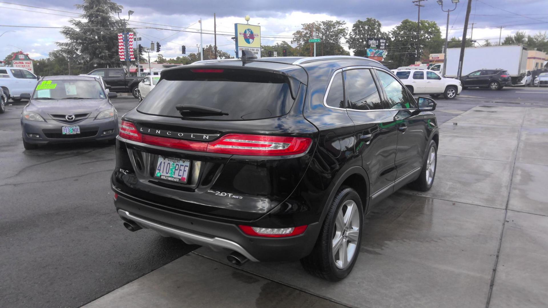 2017 BLACK Lincoln MKC Premiere AWD (5LMCJ1D99HU) with an 2.0L L4 DOHC 16V engine, 6A transmission, located at 502 S. Riverside Avenue, Medford, OR, 97501, (541) 773-3136, 42.322803, -122.867477 - Photo#2