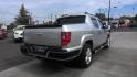 2010 SILVER Honda Ridgeline RTL (5FPYK1F57AB) with an 3.5L V6 SOHC 24V engine, 5-Speed Automatic transmission, located at 502 S. Riverside Avenue, Medford, OR, 97501, (541) 773-3136, 42.322803, -122.867477 - A Carfax "Good Value" buy, this Honda Ridgeline RTL is a sweet 4x4 for under $10k! - Photo#2