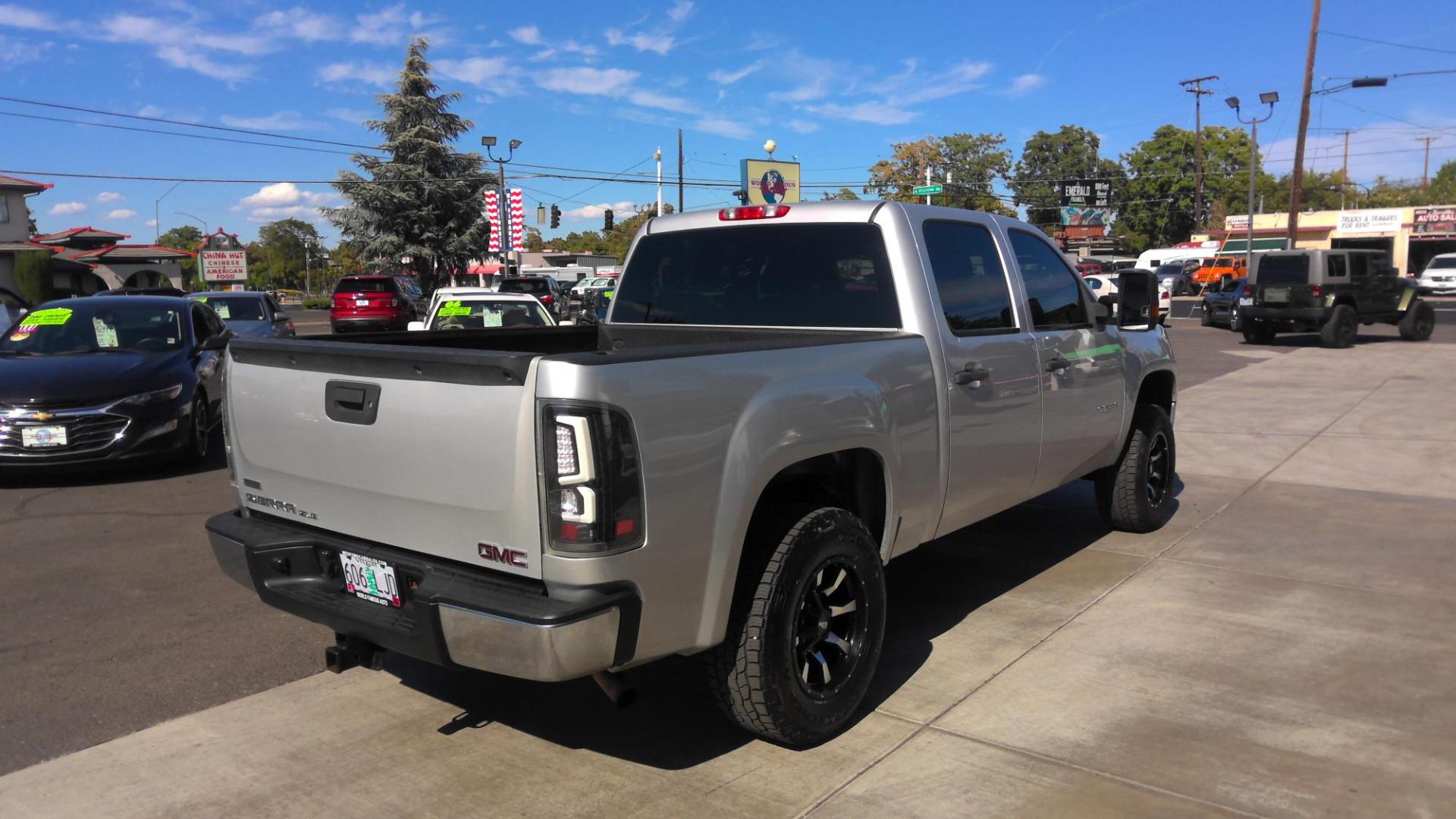 2011 SILVER /Gray GMC Sierra 1500 SLE Crew Cab 4WD (3GTP2VE37BG) with an 5.3L V8 OHV 16V FFV engine, 4-Speed Automatic transmission, located at 502 S. Riverside Avenue, Medford, OR, 97501, (541) 773-3136, 42.322803, -122.867477 - All New Motor! This 2011 GMC Sierra V8 4x4 is a great price for a full-size truck. - Photo#2