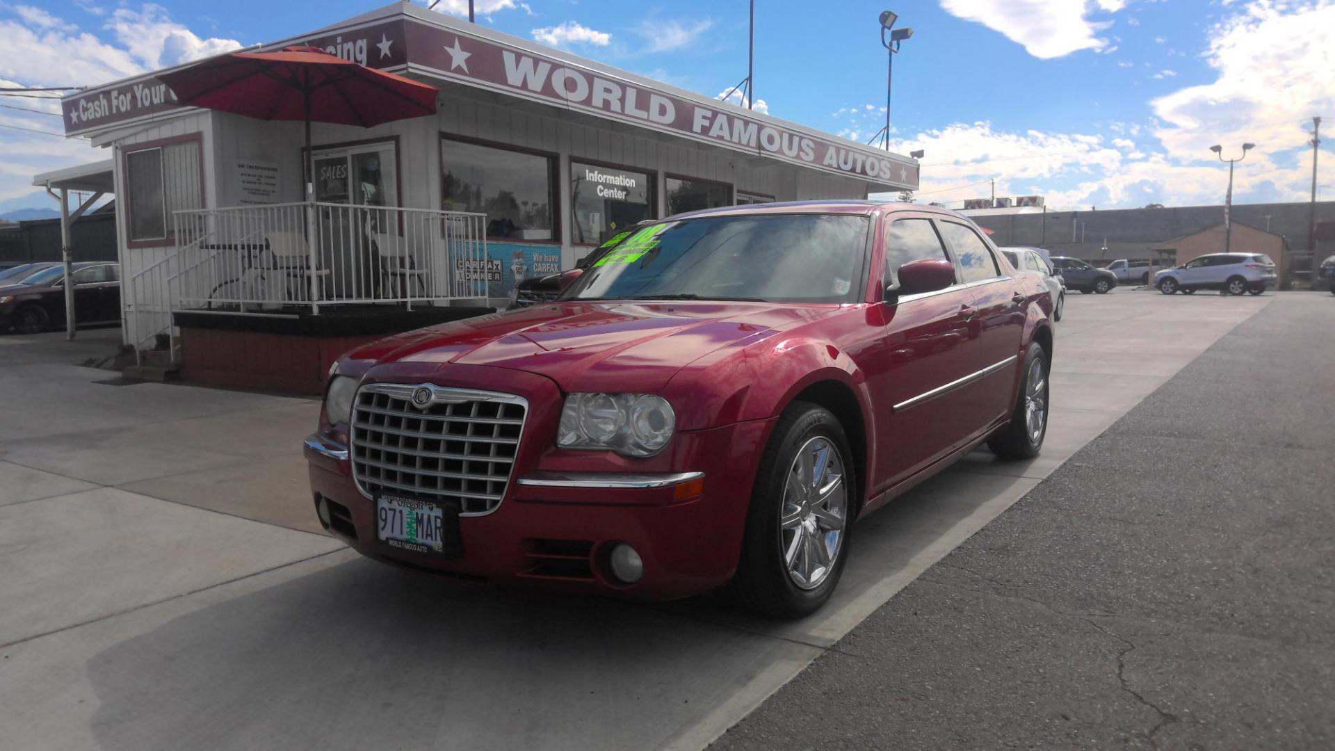 2008 RED Chrysler 300 Limited (2C3LA33G28H) with an 3.5L V6 DOHC 24V engine, 4-Speed Automatic transmission, located at 502 S. Riverside Avenue, Medford, OR, 97501, (541) 773-3136, 42.322803, -122.867477 - Photo#0