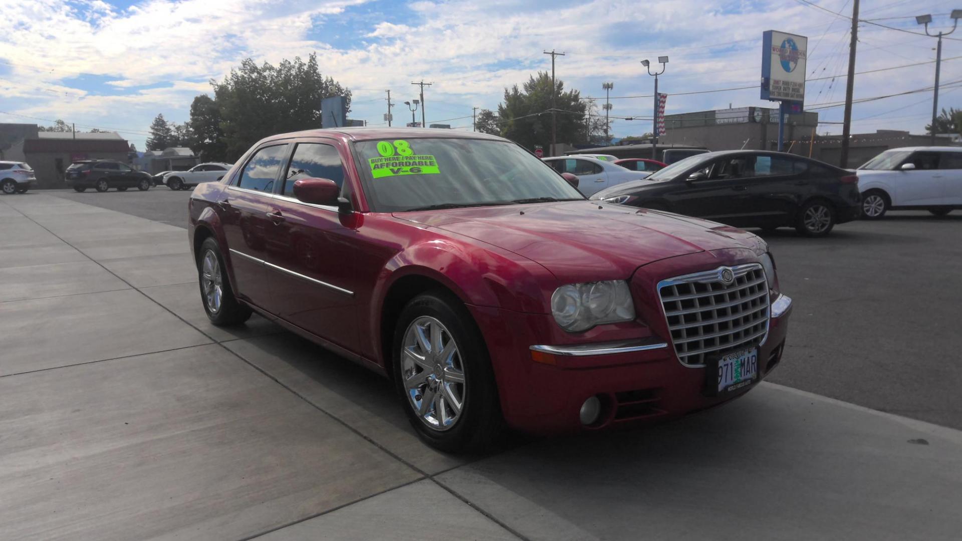 2008 RED Chrysler 300 Limited (2C3LA33G28H) with an 3.5L V6 DOHC 24V engine, 4-Speed Automatic transmission, located at 502 S. Riverside Avenue, Medford, OR, 97501, (541) 773-3136, 42.322803, -122.867477 - Photo#1