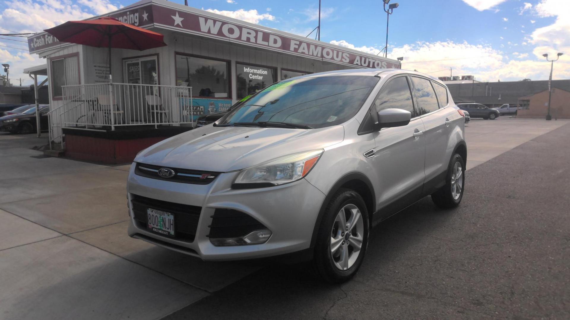 2013 SILVER Ford Escape SE 4WD (1FMCU9G9XDU) with an 2.0L L4 DOHC 16V engine, 6-Speed Automatic transmission, located at 502 S. Riverside Avenue, Medford, OR, 97501, (541) 773-3136, 42.322803, -122.867477 - Photo#0