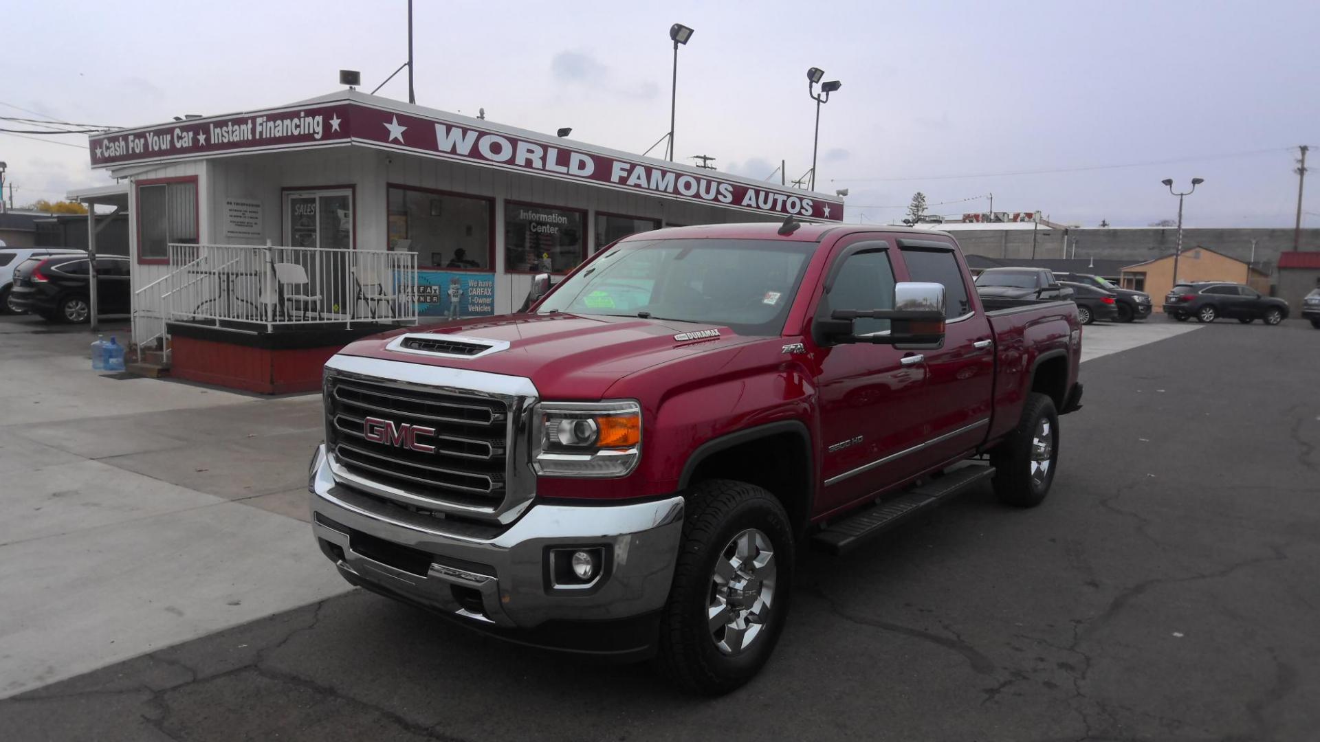 2019 RED /Black GMC Sierra 3500HD SLT Crew Cab 4WD (1GT42VCYXKF) with an 6.6L V8 OHV 16 DIESEL engine, 6A transmission, located at 502 S. Riverside Avenue, Medford, OR, 97501, (541) 773-3136, 42.322803, -122.867477 - This 6.6L Duramax GMC Sierra 3500 is a CARFAX 1-Owner as a great heavy-duty crew cab pickup truck. - Photo#0