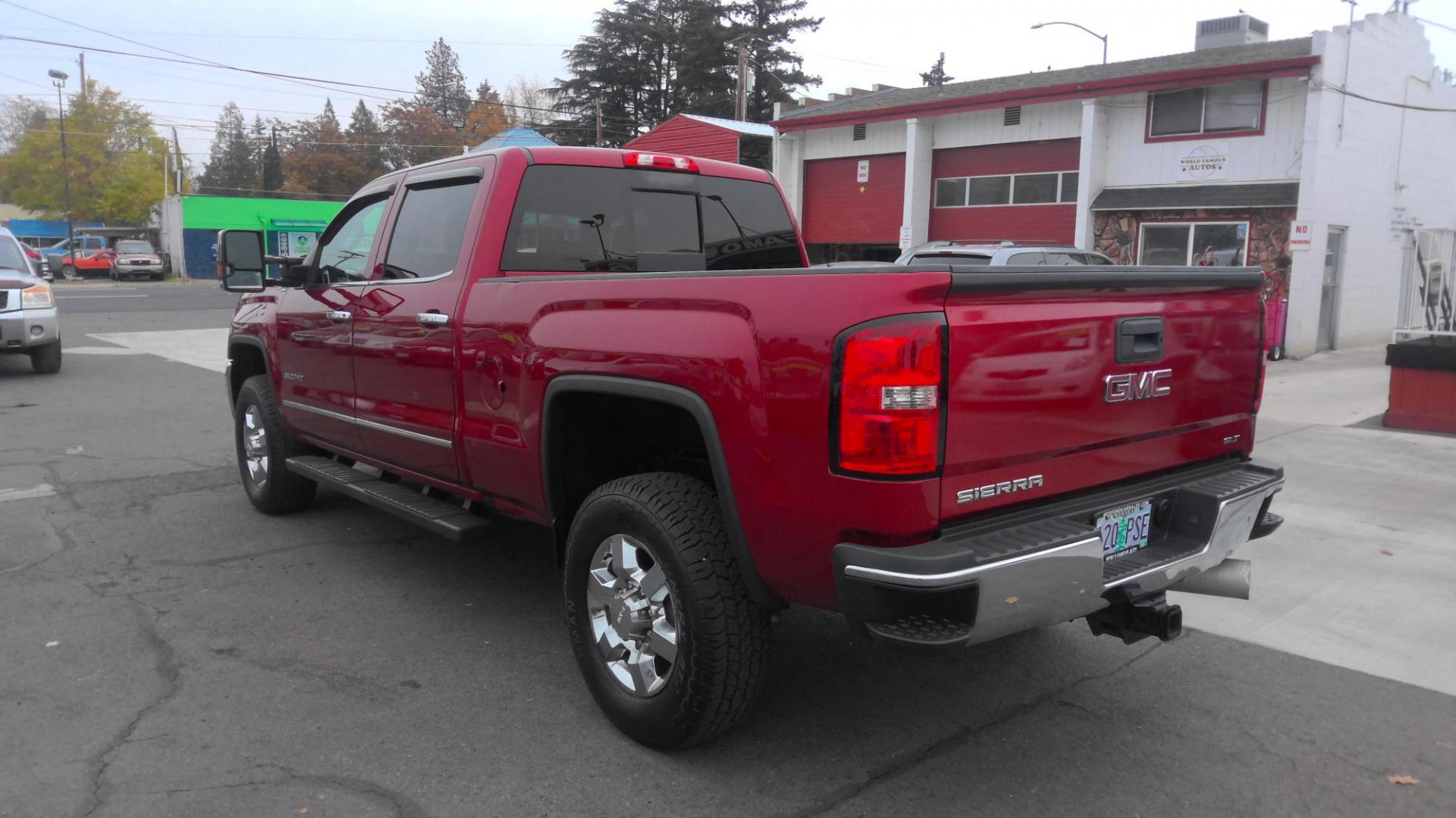 2019 RED /Black GMC Sierra 3500HD SLT Crew Cab 4WD (1GT42VCYXKF) with an 6.6L V8 OHV 16 DIESEL engine, 6A transmission, located at 502 S. Riverside Avenue, Medford, OR, 97501, (541) 773-3136, 42.322803, -122.867477 - This 6.6L Duramax GMC Sierra 3500 is a CARFAX 1-Owner as a great heavy-duty crew cab pickup truck. - Photo#4