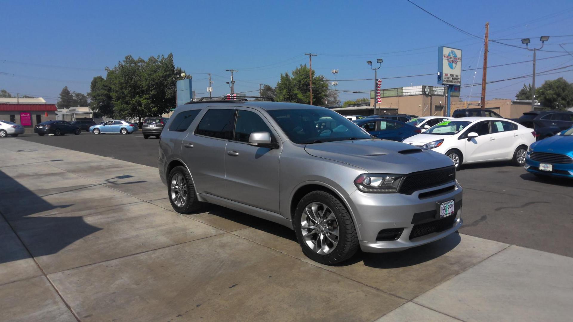 2019 GRAY /Black Dodge Durango R/T AWD (1C4SDJCT1KC) with an 5.7L V8 OHV 16V engine, 8A transmission, located at 502 S. Riverside Avenue, Medford, OR, 97501, (541) 773-3136, 42.322803, -122.867477 - This powerhouse of an SUV with the 5.7L V8 HEMI is the R/T Dodge Durango, with Sport tuning & suspension, 20" wheels, real-load leveling, and selectable steering modes - plus comfort features like heated seats, Alpine stereo system, power memory seats, and roof rails w/ crossbars. - Photo#1