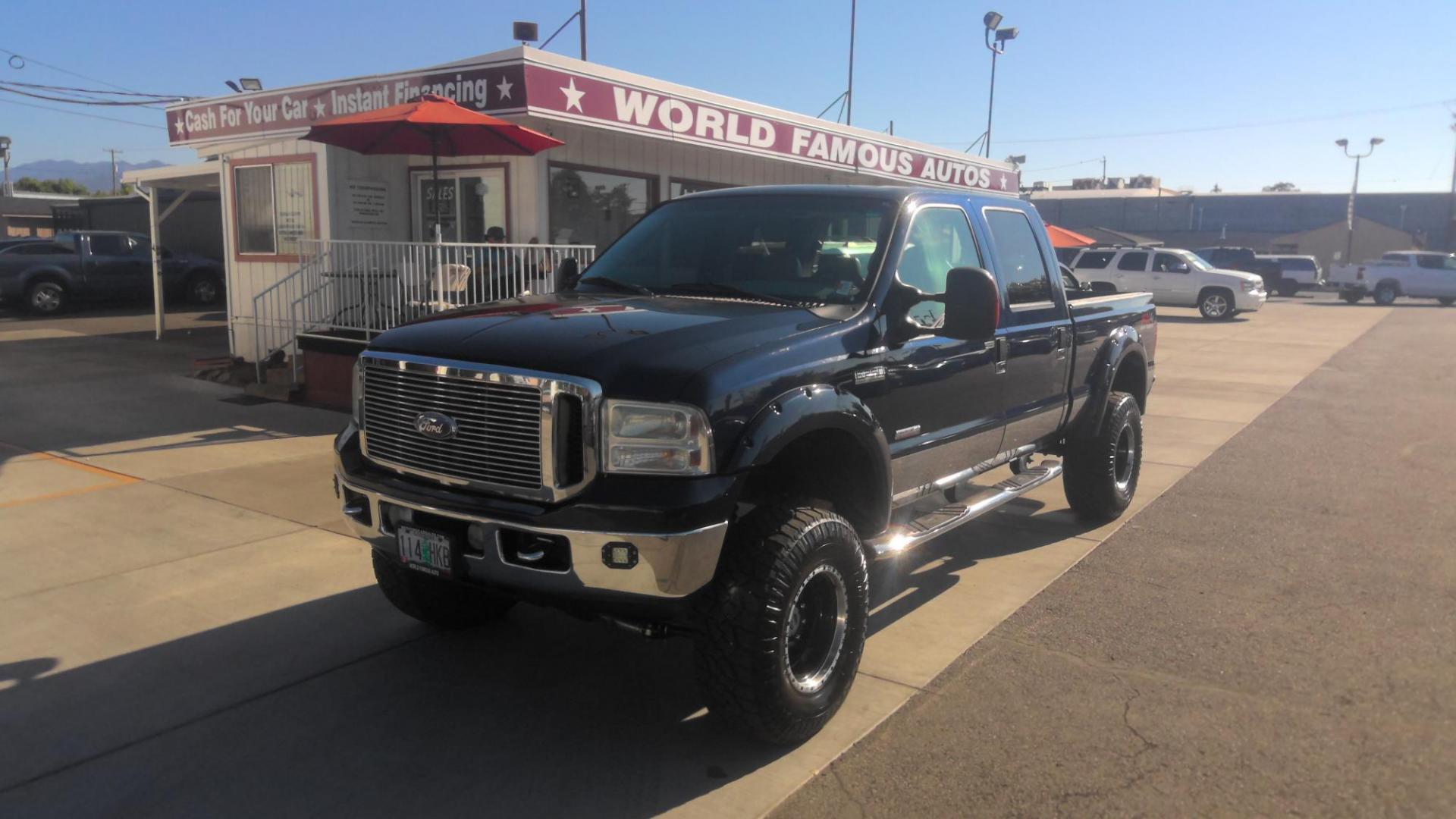 2007 BLUE /Gray Ford F-250 SD Lariat Crew Cab 4WD (1FTSW21P07E) with an 6.0L V8 OHV 32V TURBO DIESEL engine, Automatic transmission, located at 502 S. Riverside Avenue, Medford, OR, 97501, (541) 773-3136, 42.322803, -122.867477 - You've got to come drive this truck for yourself - a 2007 F250 Super-Duty Lariat with low miles and a clean Carfax Vehicle History, this is the ultimate work or play truck at a great price. - Photo#0