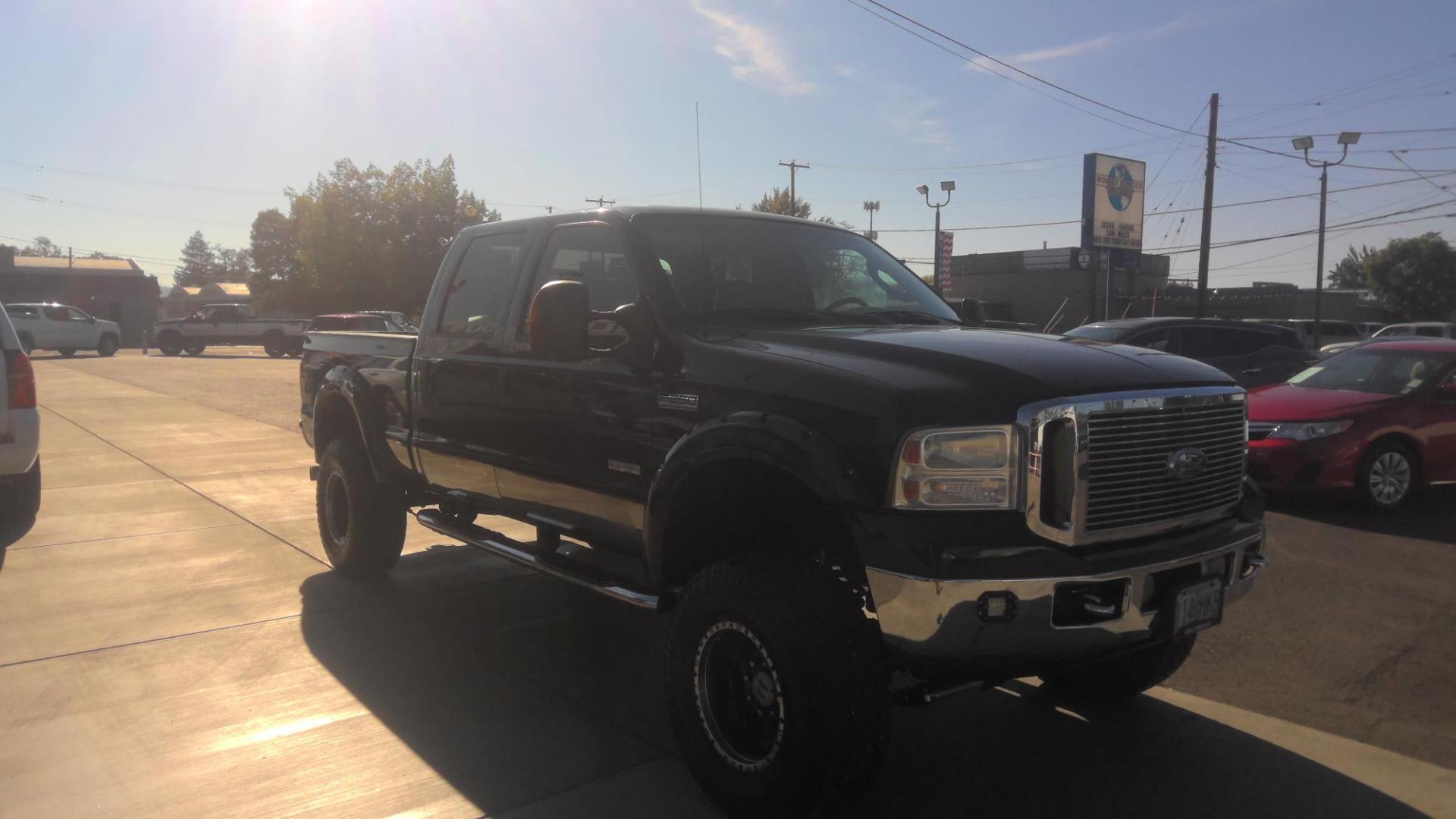 2007 BLUE /Gray Ford F-250 SD Lariat Crew Cab 4WD (1FTSW21P07E) with an 6.0L V8 OHV 32V TURBO DIESEL engine, Automatic transmission, located at 502 S. Riverside Avenue, Medford, OR, 97501, (541) 773-3136, 42.322803, -122.867477 - You've got to come drive this truck for yourself - a 2007 F250 Super-Duty Lariat with low miles and a clean Carfax Vehicle History, this is the ultimate work or play truck at a great price. - Photo#1