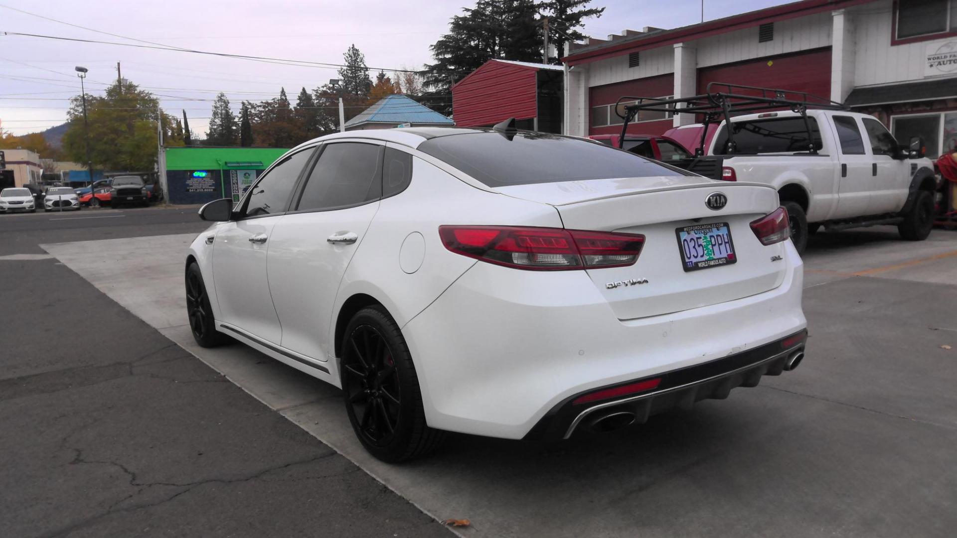 2016 WHITE Kia Optima SXL Turbo (5XXGV4L26GG) with an 2.0L L4 DOHC 16V TURBO engine, 6A transmission, located at 502 S. Riverside Avenue, Medford, OR, 97501, (541) 773-3136, 42.322803, -122.867477 - Photo#3