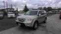 2011 SILVER Honda Pilot EX-L 4WD 5-Spd AT (5FNYF4H58BB) with an 3.5L V6 SOHC 24V engine, 5-Speed Automatic transmission, located at 502 S. Riverside Avenue, Medford, OR, 97501, (541) 773-3136, 42.322803, -122.867477 - Photo#1