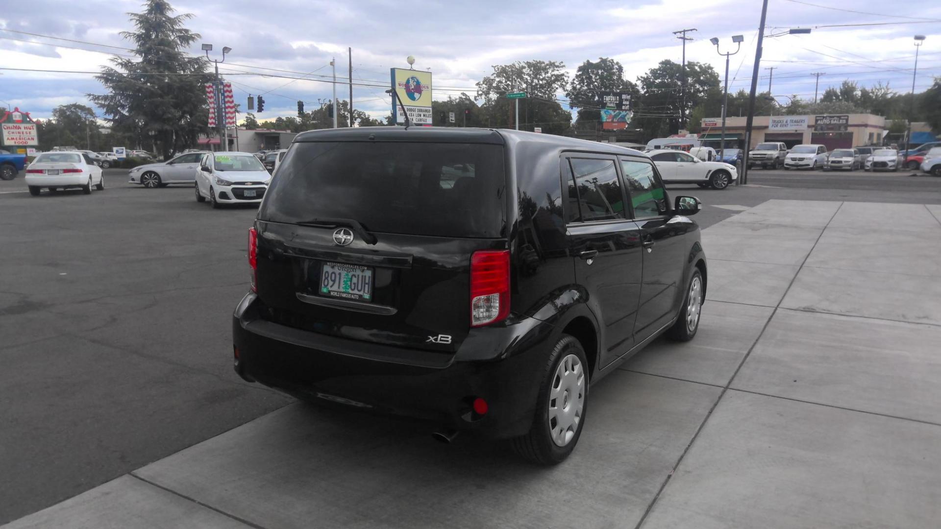 2012 BLACK Scion xB 5-Door Wagon 5-Spd MT (JTLZE4FE0CJ) with an 2.4L L4 DOHC 16V engine, 5-Speed Manual transmission, located at 502 S. Riverside Avenue, Medford, OR, 97501, (541) 773-3136, 42.322803, -122.867477 - Photo#2