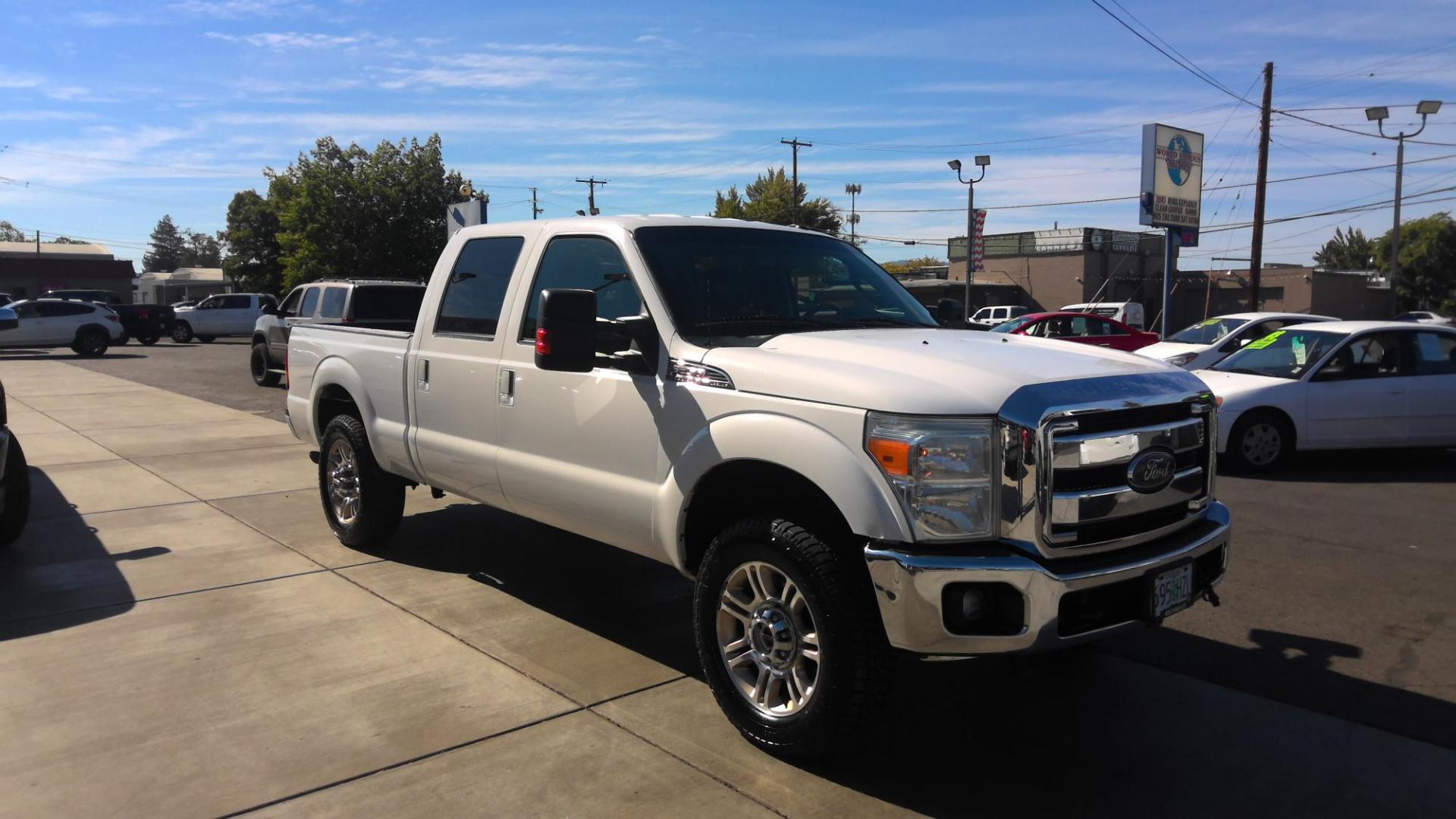 2012 WHITE Ford F-250 SD King Ranch Crew Cab 4WD (1FT7W2B67CE) with an 6.2L V8 OHV 16V engine, 6-Speed Automatic transmission, located at 502 S. Riverside Avenue, Medford, OR, 97501, (541) 773-3136, 42.322803, -122.867477 - Photo#0