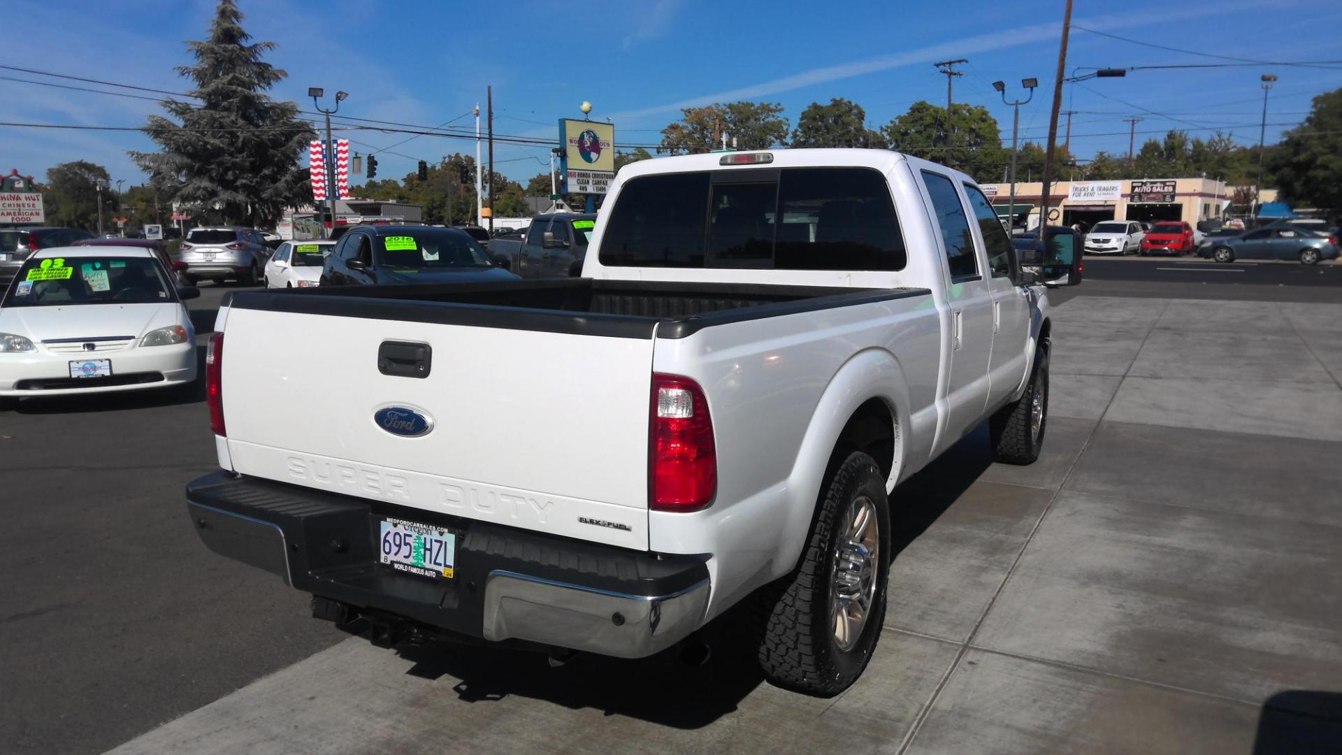 2012 WHITE Ford F-250 SD King Ranch Crew Cab 4WD (1FT7W2B67CE) with an 6.2L V8 OHV 16V engine, 6-Speed Automatic transmission, located at 502 S. Riverside Avenue, Medford, OR, 97501, (541) 773-3136, 42.322803, -122.867477 - Photo#2