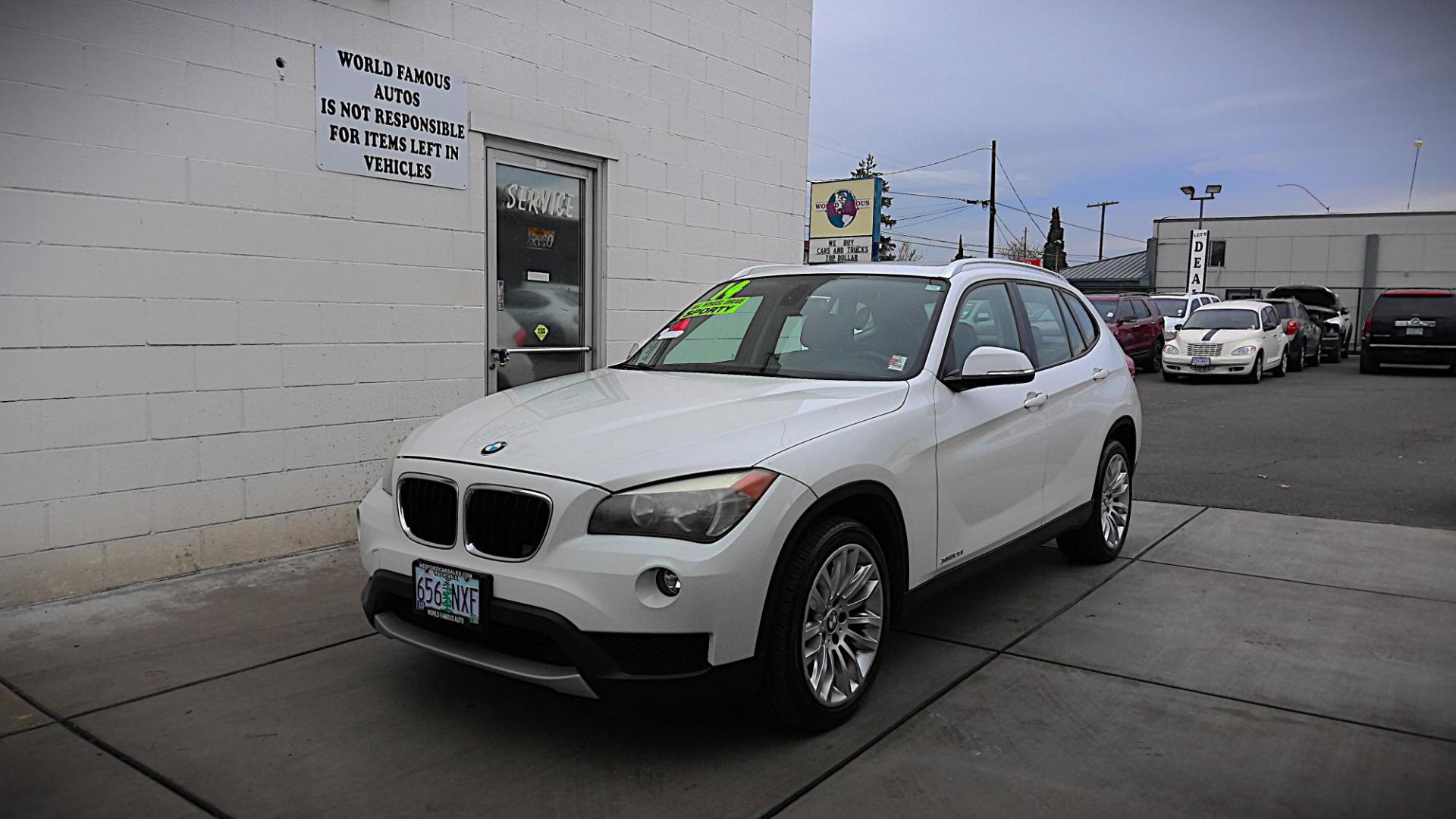 2014 WHITE BMW X1 xDrive28i (WBAVL1C59EV) with an 2.0L L4 DOHC 16V engine, 8-Speed Automatic transmission, located at 502 S. Riverside Avenue, Medford, OR, 97501, (541) 773-3136, 42.322803, -122.867477 - Photo#1