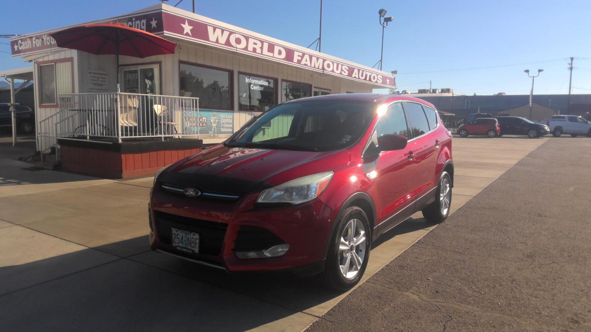 2014 RED Ford Escape SE FWD (1FMCU0G96EU) with an 2.0L L4 DOHC 16V engine, 6-Speed Automatic transmission, located at 502 S. Riverside Avenue, Medford, OR, 97501, (541) 773-3136, 42.322803, -122.867477 - Photo#0