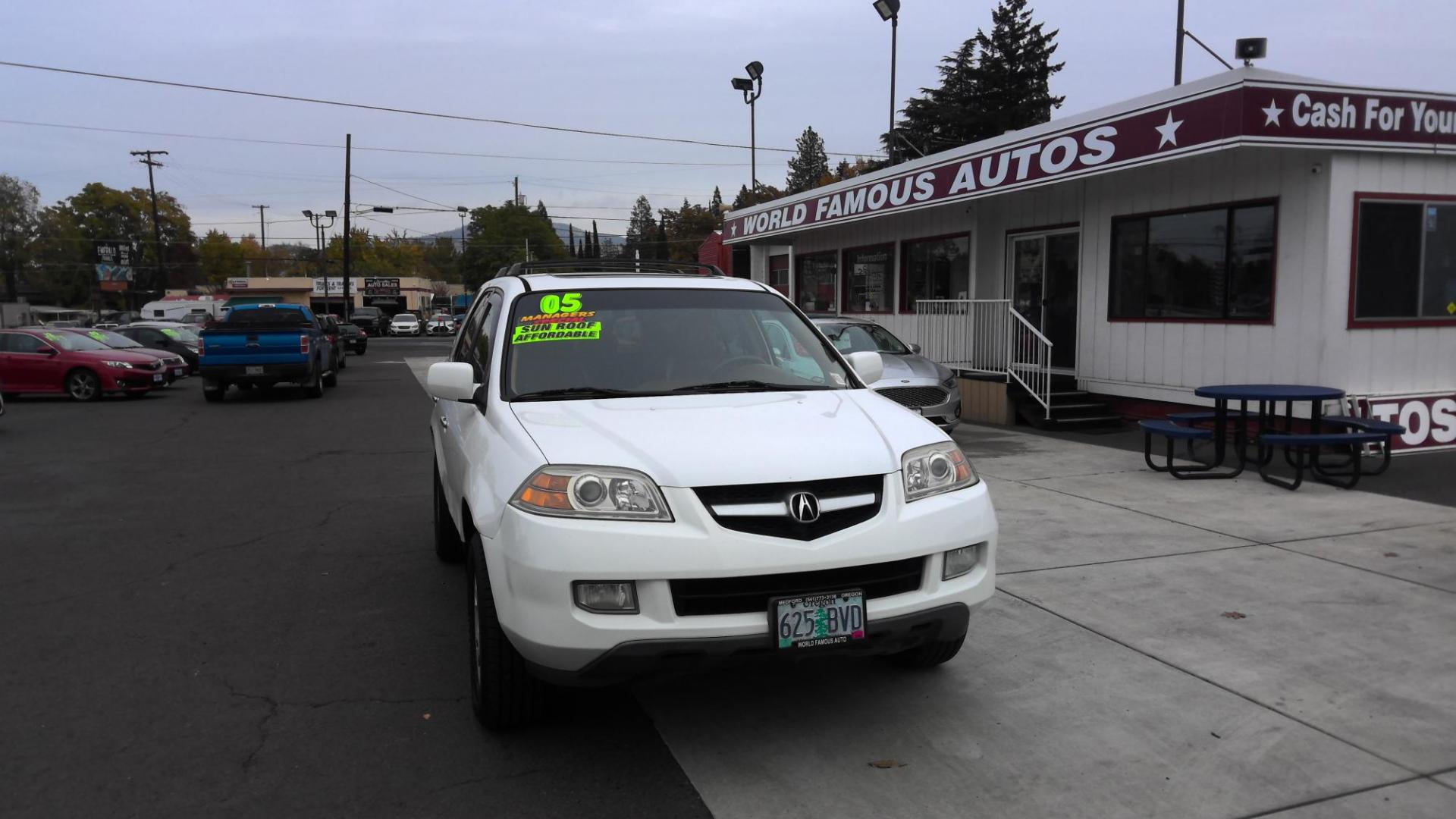 2005 WHITE Acura MDX Touring with Navigation System (2HNYD18865H) with an 3.5L V6 SOHC 24V engine, 5-Speed Automatic Overdrive transmission, located at 502 S. Riverside Avenue, Medford, OR, 97501, (541) 773-3136, 42.322803, -122.867477 - Photo#0